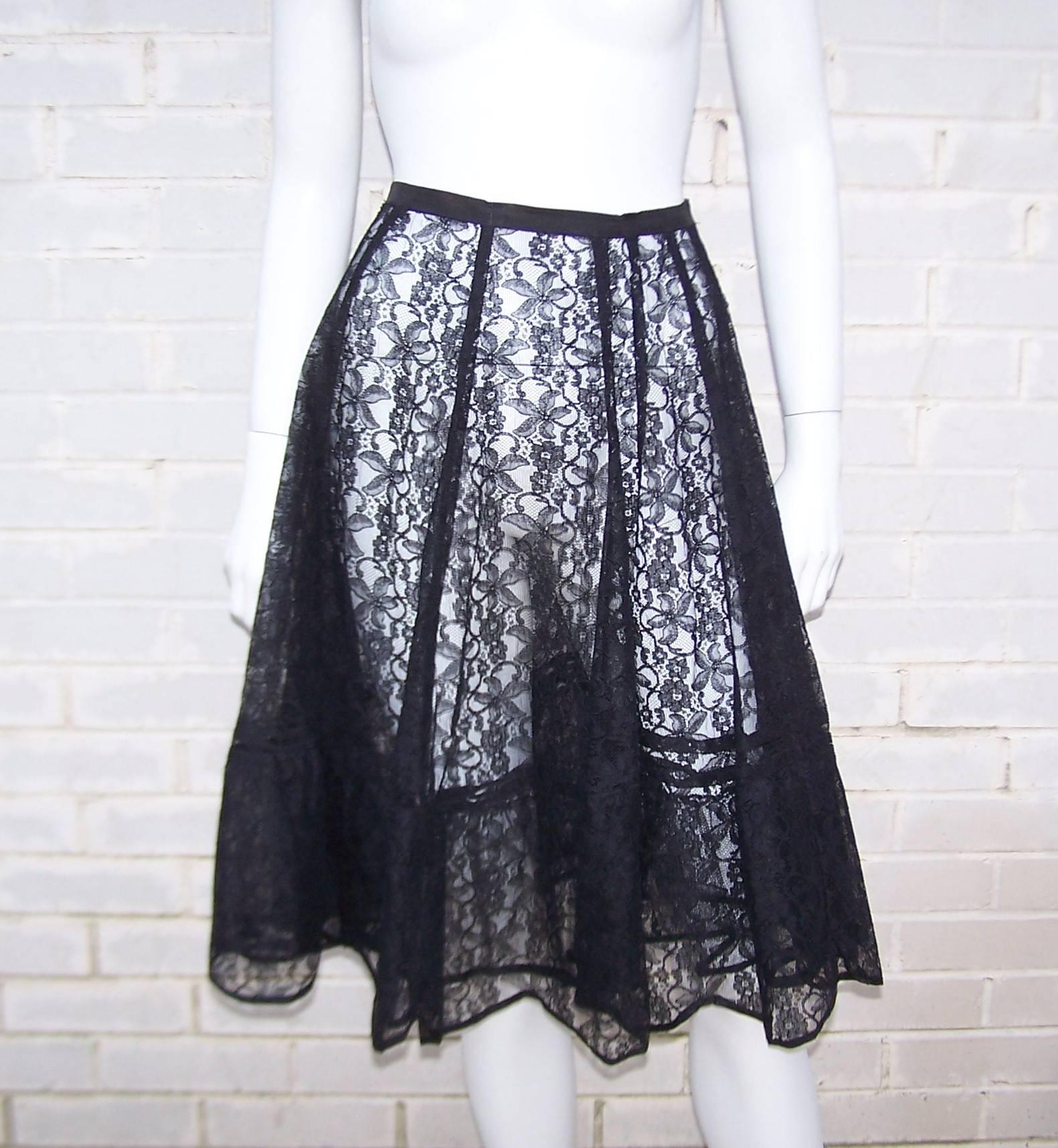 Layers of lace can be just as seductive as something that leaves little to the imagination.  This 1950's black lace underskirt by Tempo Lingerie was made for layering under a circle skirt or full skirted dress.  The intricate nylon lace is paneled