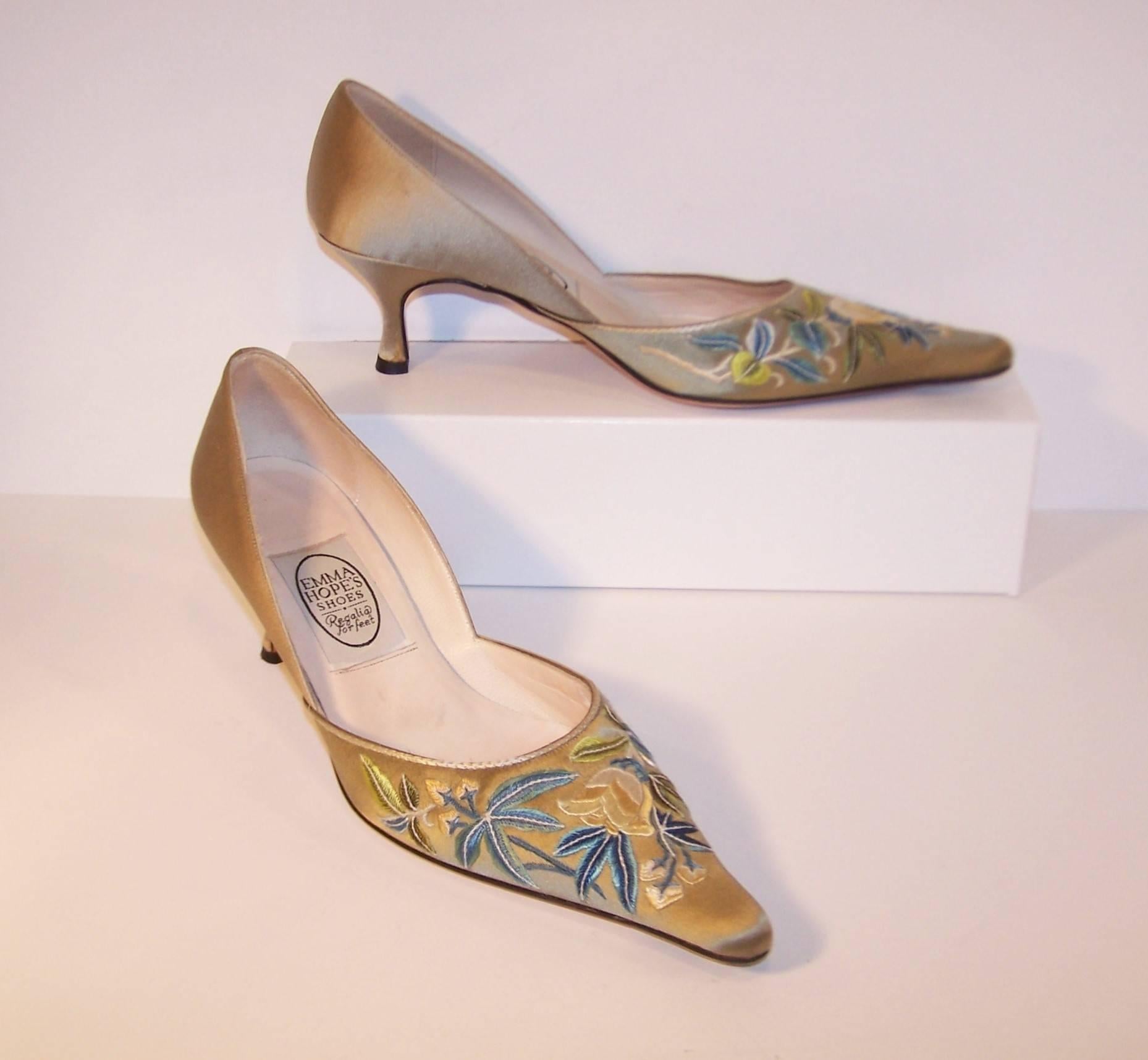 Emma Hope's tag line for her luxuriously hand crafted shoes is 'Regalia for the Feet' ... and that's the truth!  These lovely shoes are a pale sage green satin with floral embroidery in contrasting colors such as peacock blue, aqua, creme and