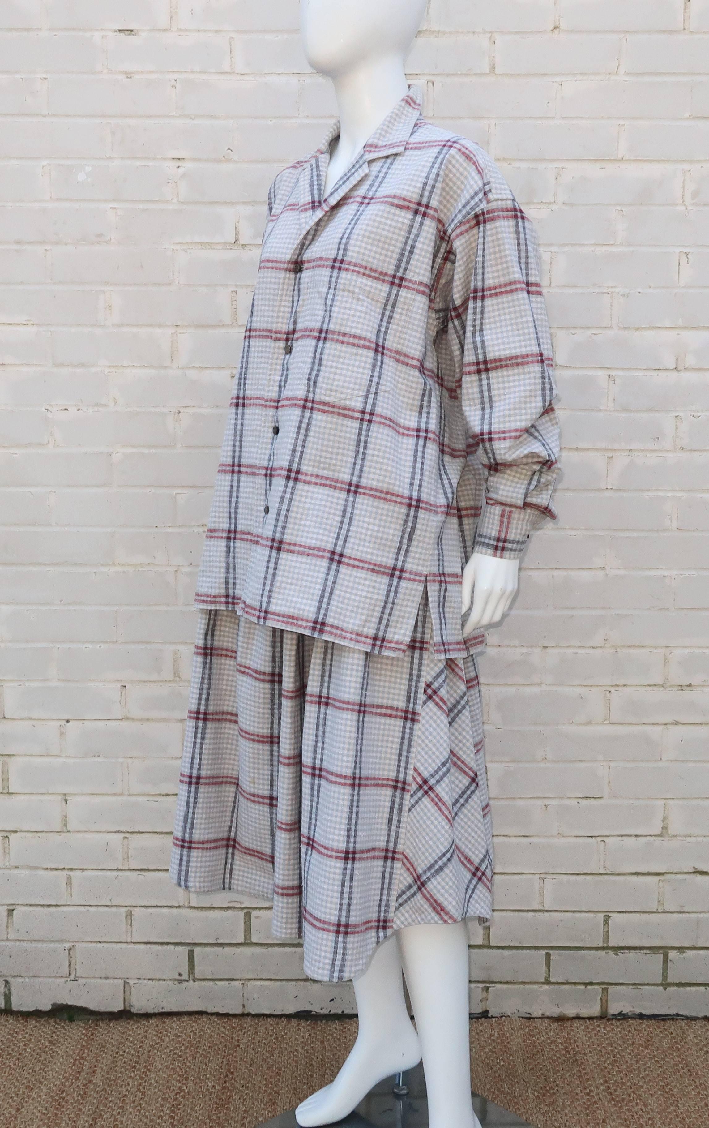 This nubby cotton windowpane plaid 2-piece ensemble by Issey Miyake for his Plantation line is reminiscent of vintage Japanese farmer's clothing.  The menswear style shirt top buttons up the front and cuffs with side vents and breast pocket.  The