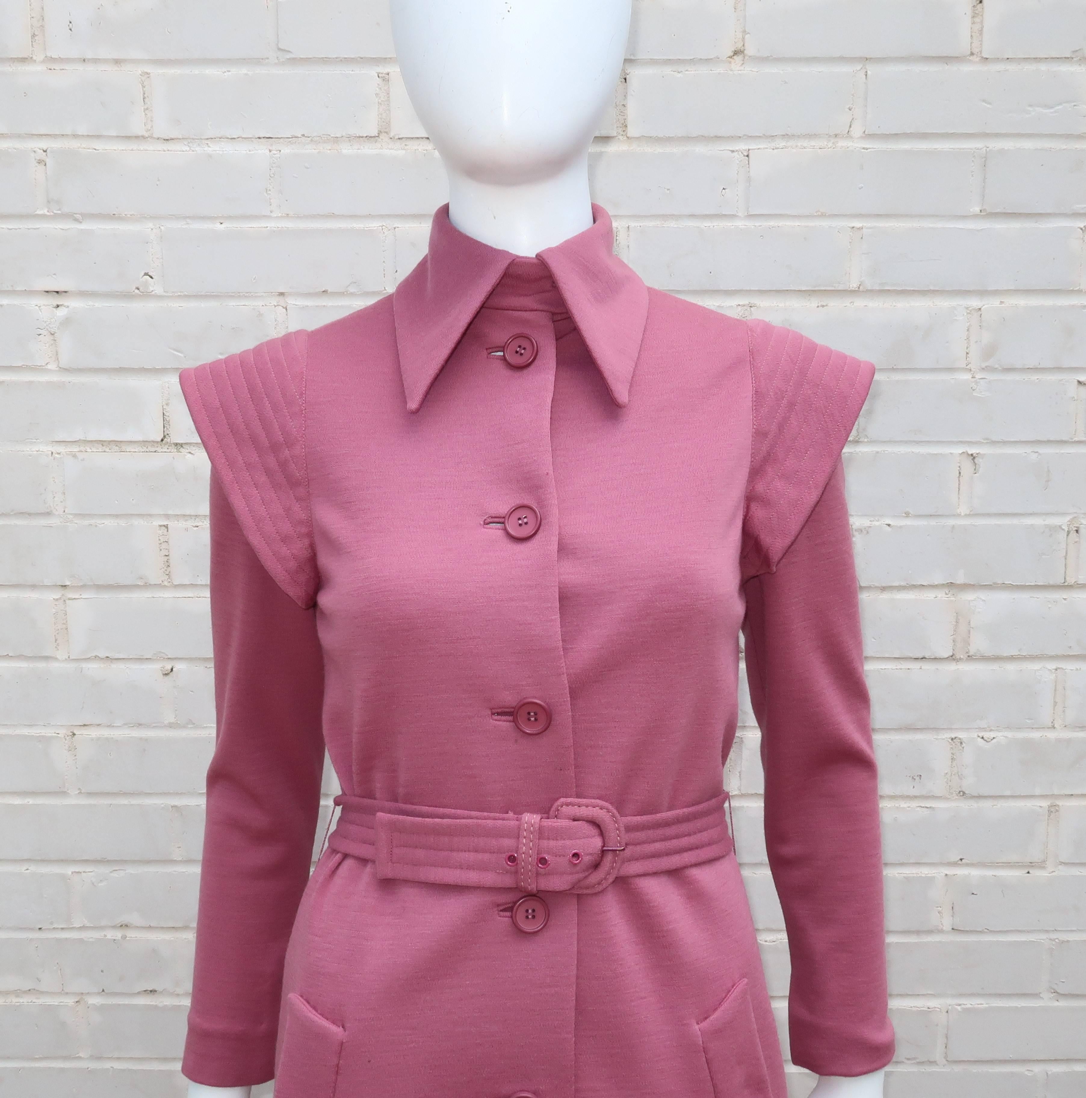 There is something decidedly futuristic about Geoffrey Beene's 1960s take on the classic coat dress.  It all begins with a sophisticated silhouette in a mauve wool knit fabric ... then add winged epaulets at the top of the sleeve and an exaggerated