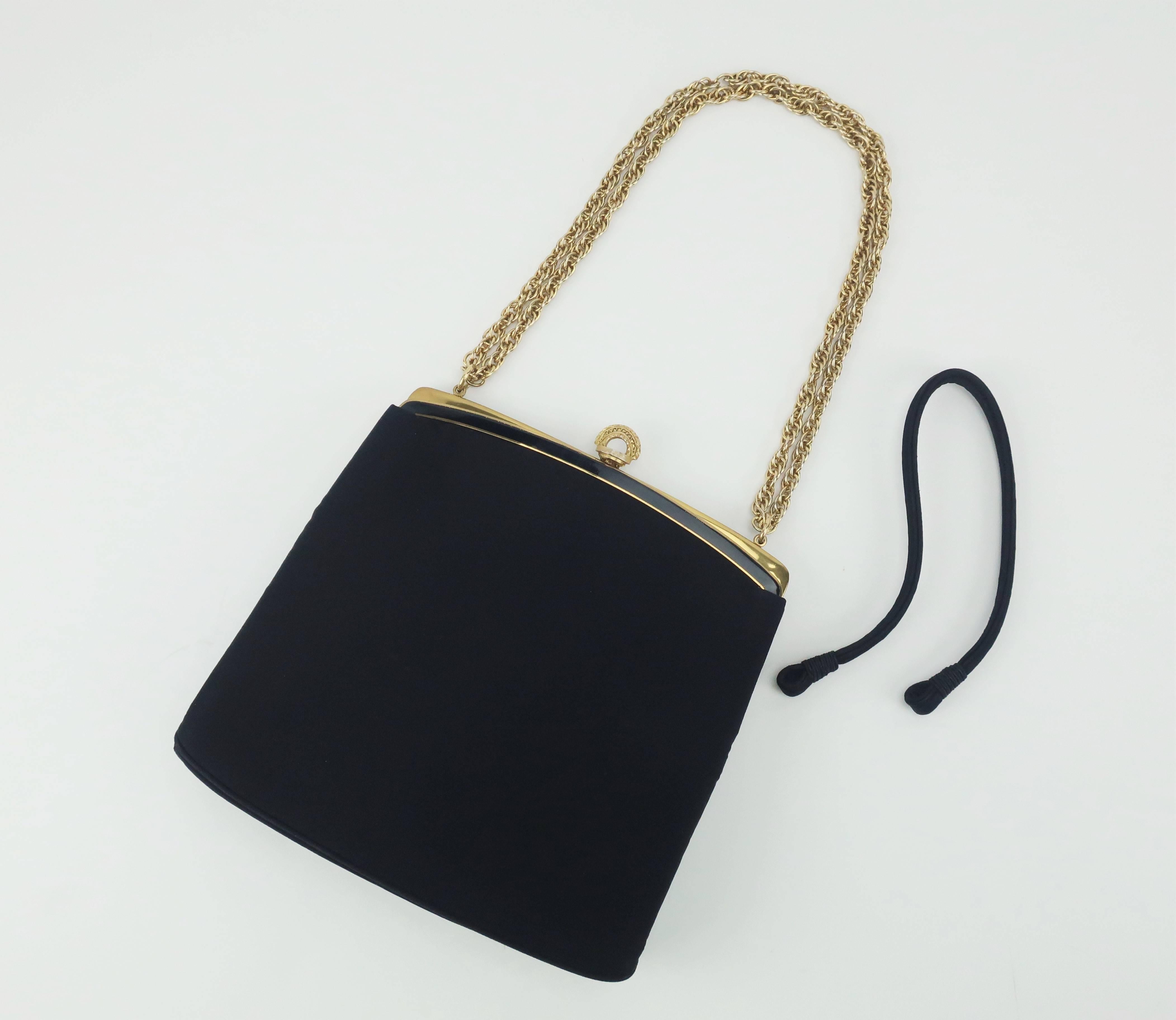 Harry Rosenfeld handbags were distinguished not only by their quality and style but also by their unique decorative features.  This understated C.1960 black faille evening handbag is a lovely example of how classic craftsmanship is perfect in any