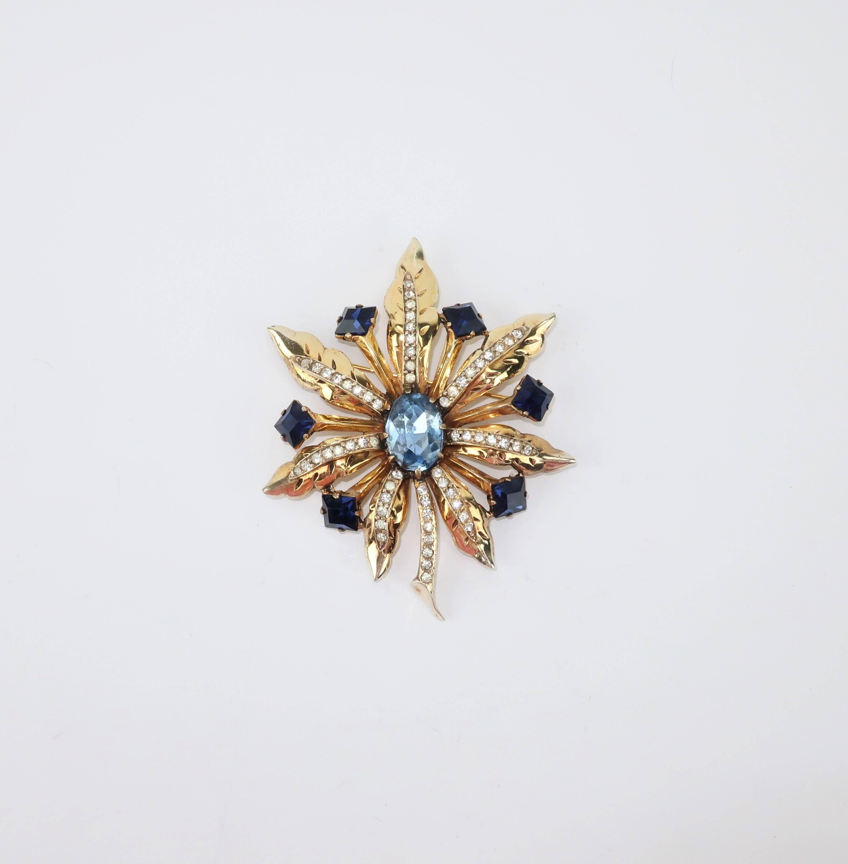 Eisenberg originally produced jewelry to accessorize their clothing line and though their fashions were popular, the brilliant pieces of costume jewelry were the real showstoppers.  This C.1940 brooch is made with all the refined details of fine