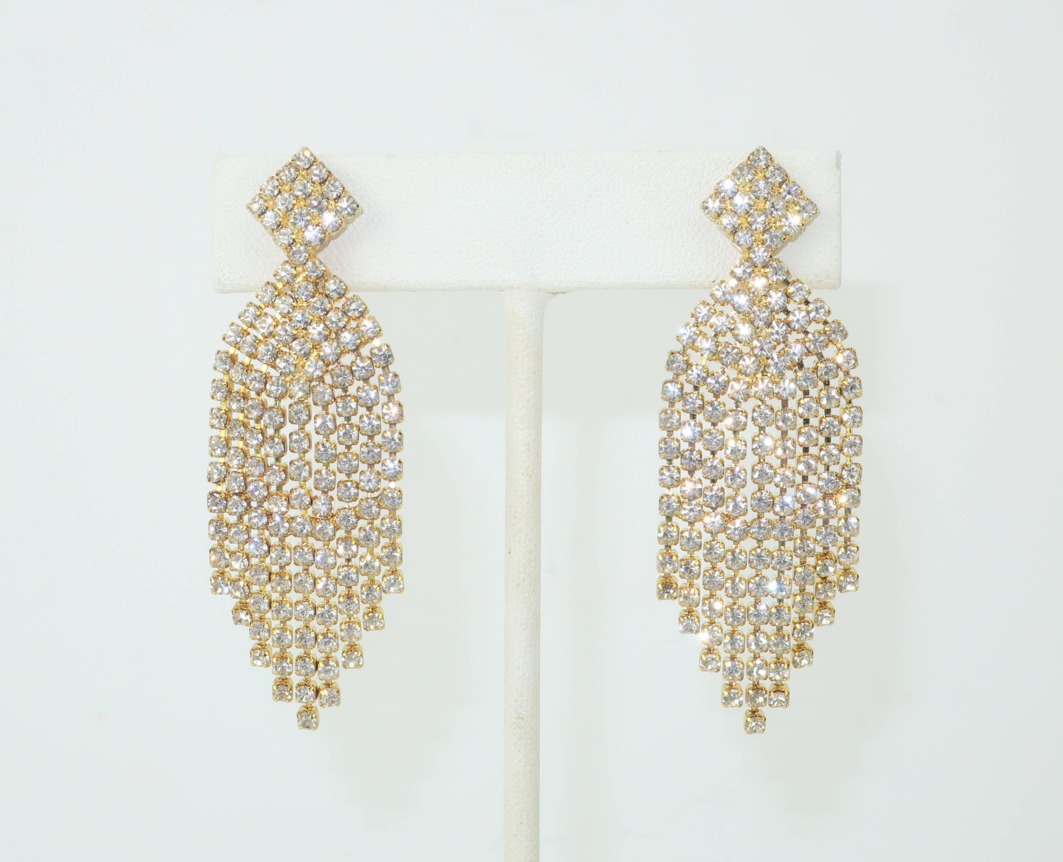 Les Bernard's founders, Bernard Shapiro and Lester Joy, were committed to creating high quality costume jewelry with an eye for innovation and classic style.  These waterfall earrings are beautifully made with a gold tone screw back clip on base and