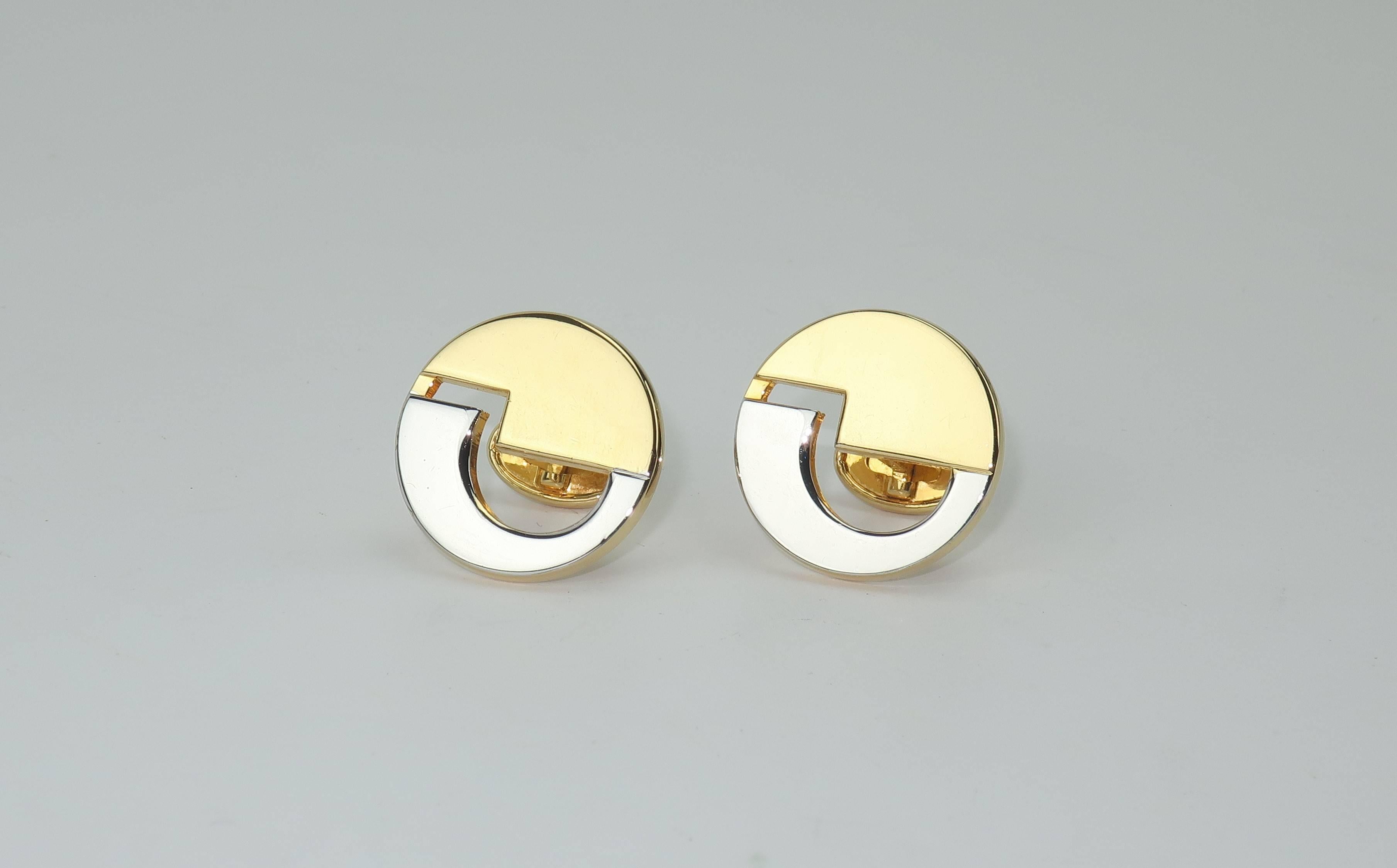 Pierre Cardin's space age designs from the 1960's and 1970’s are the epitome of the mod and futuristic vision of the time.  These two-tone gold and silver cufflinks combine futurism with classic polished style.  The abstract modernist logo design