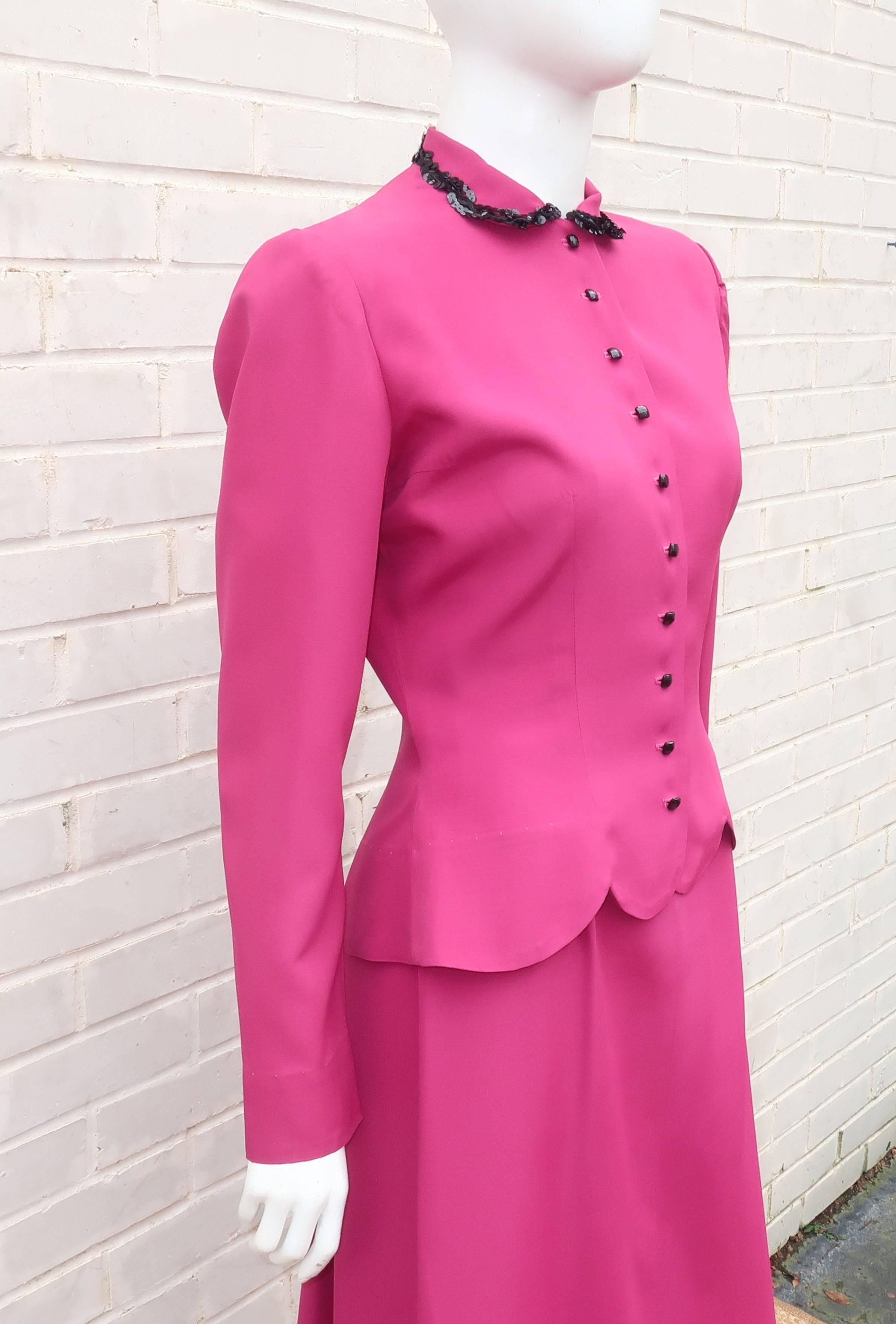 The Jonathan Logan clothing company catered to the ‘young cosmopolitan’ ... always pretty and classy without being trendy.  This early 1950’s magenta faille skirt suit features a sweet peplum jacket with a black sequin embellished peter pan collar,
