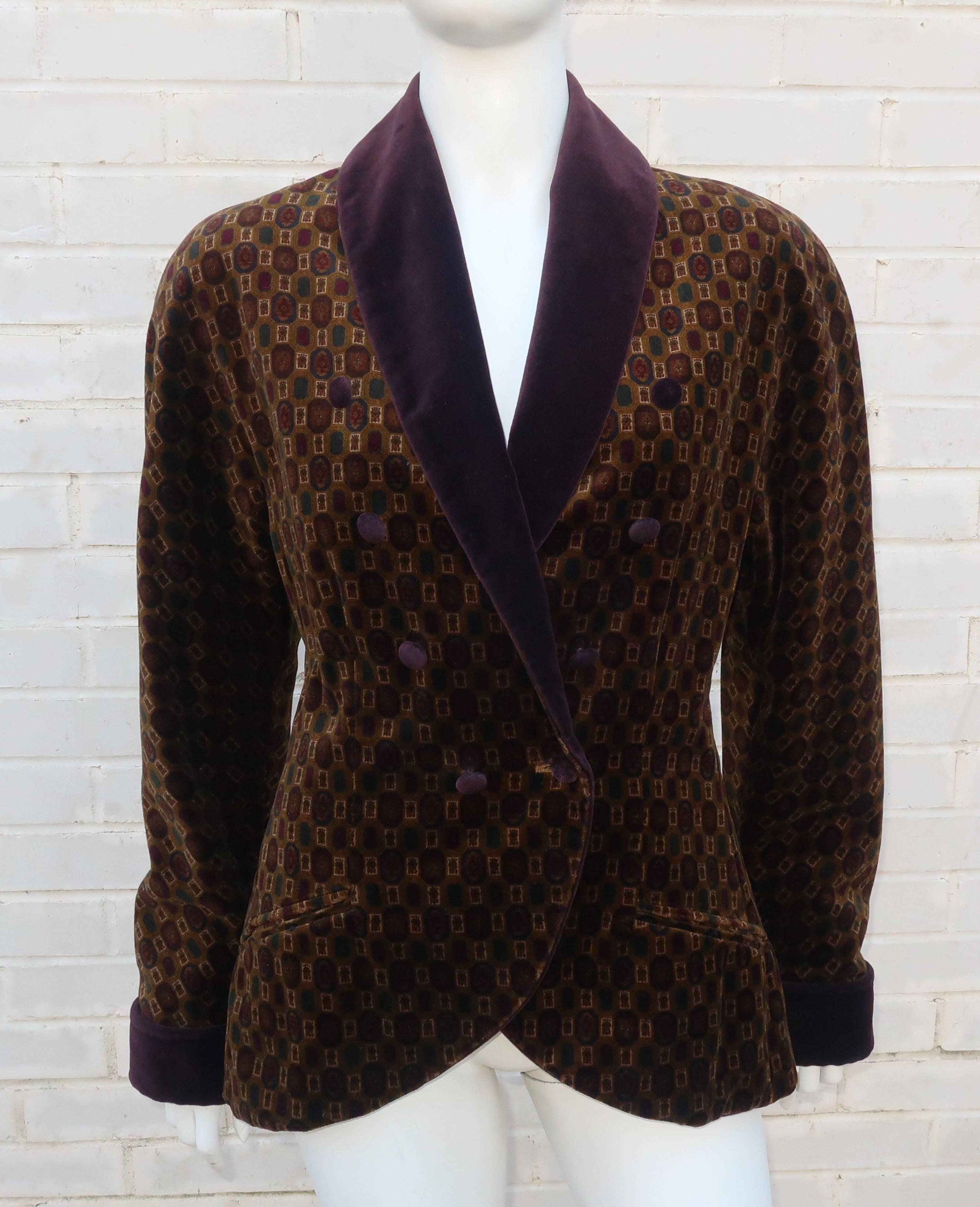 Prepare for an evening by the fire with Genny’s feminine spin on the classic smoking jacket.  The 1980’s cotton velvet silhouette features a modified shawl collar and upturned cuffs in deep plum and a double breasted body in an old world pattern of