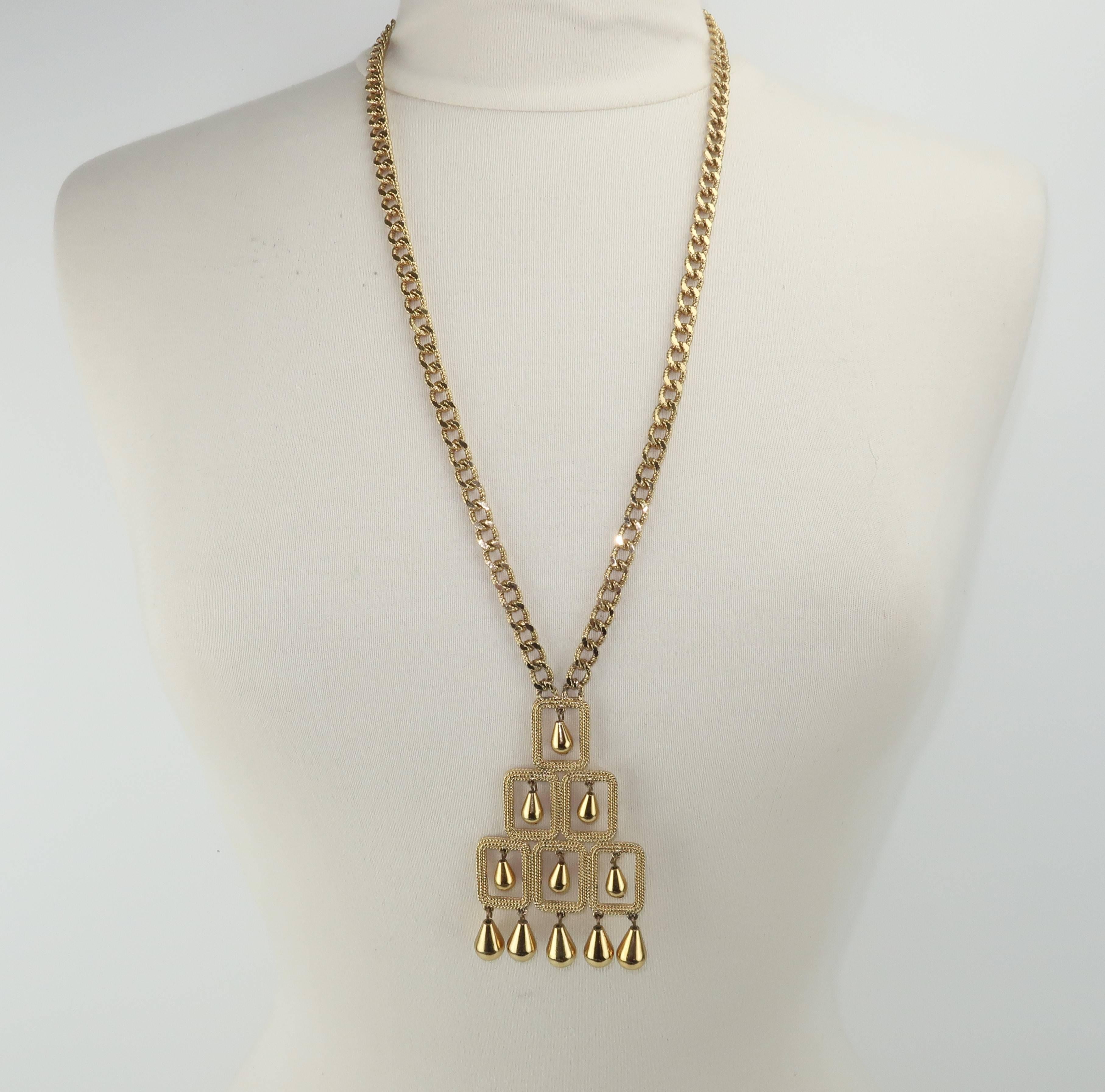 A fun statement necklace can be just the right accessory to add a dash of vintage to a modern ensemble.  This 1960’s gold tone necklace from Monet bears the quality of fine costume jewelry with a modernist design typical of the era.  The chunky link
