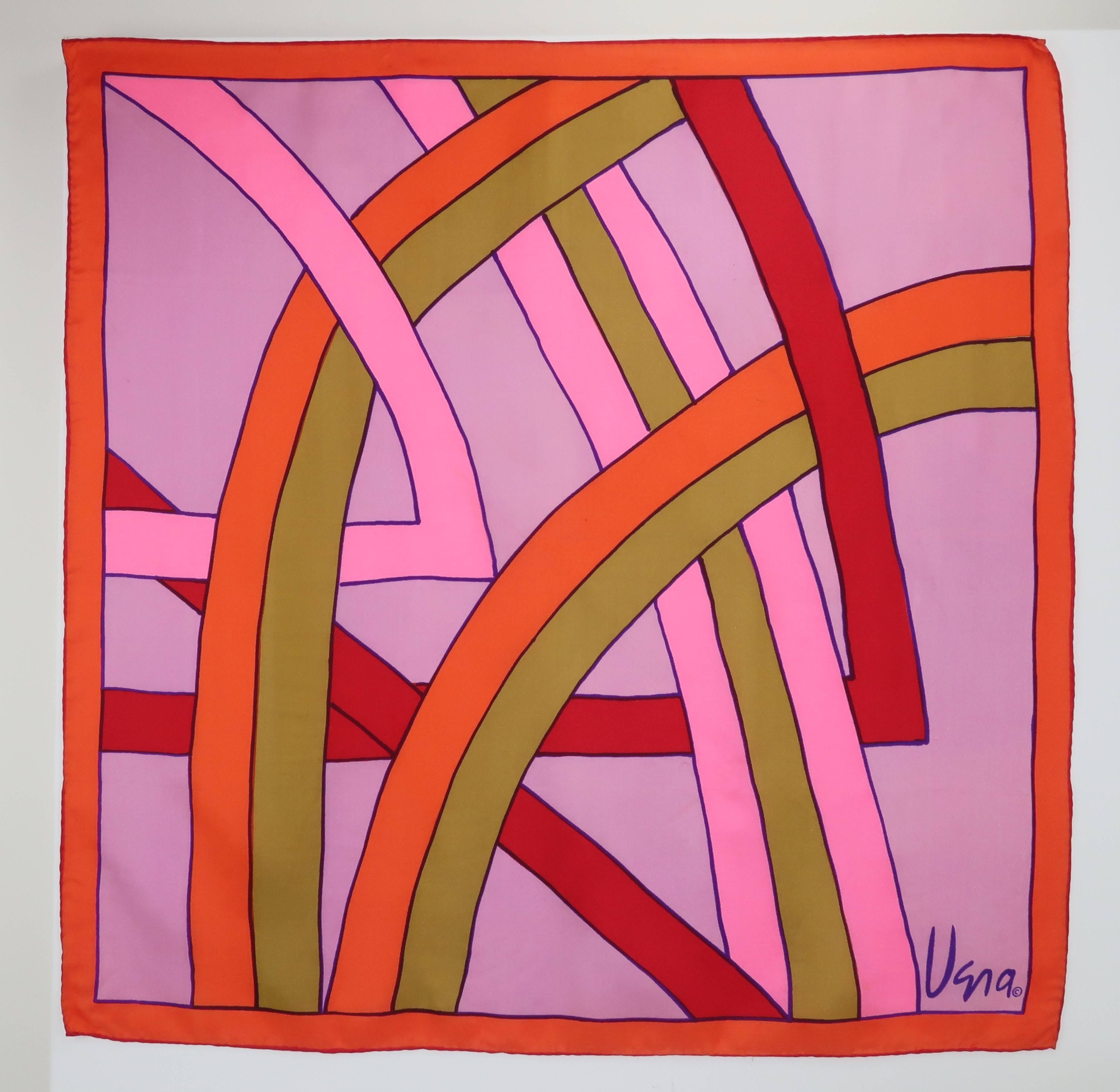 Vera Neumann's talent as a colorist is evident in this pop mod silk scarf incorporating graphic hues of pink, red, green, orange and lilac.  The colors intersect in a modernist pattern reminiscent of the minimalist style of Frank Stella's artwork