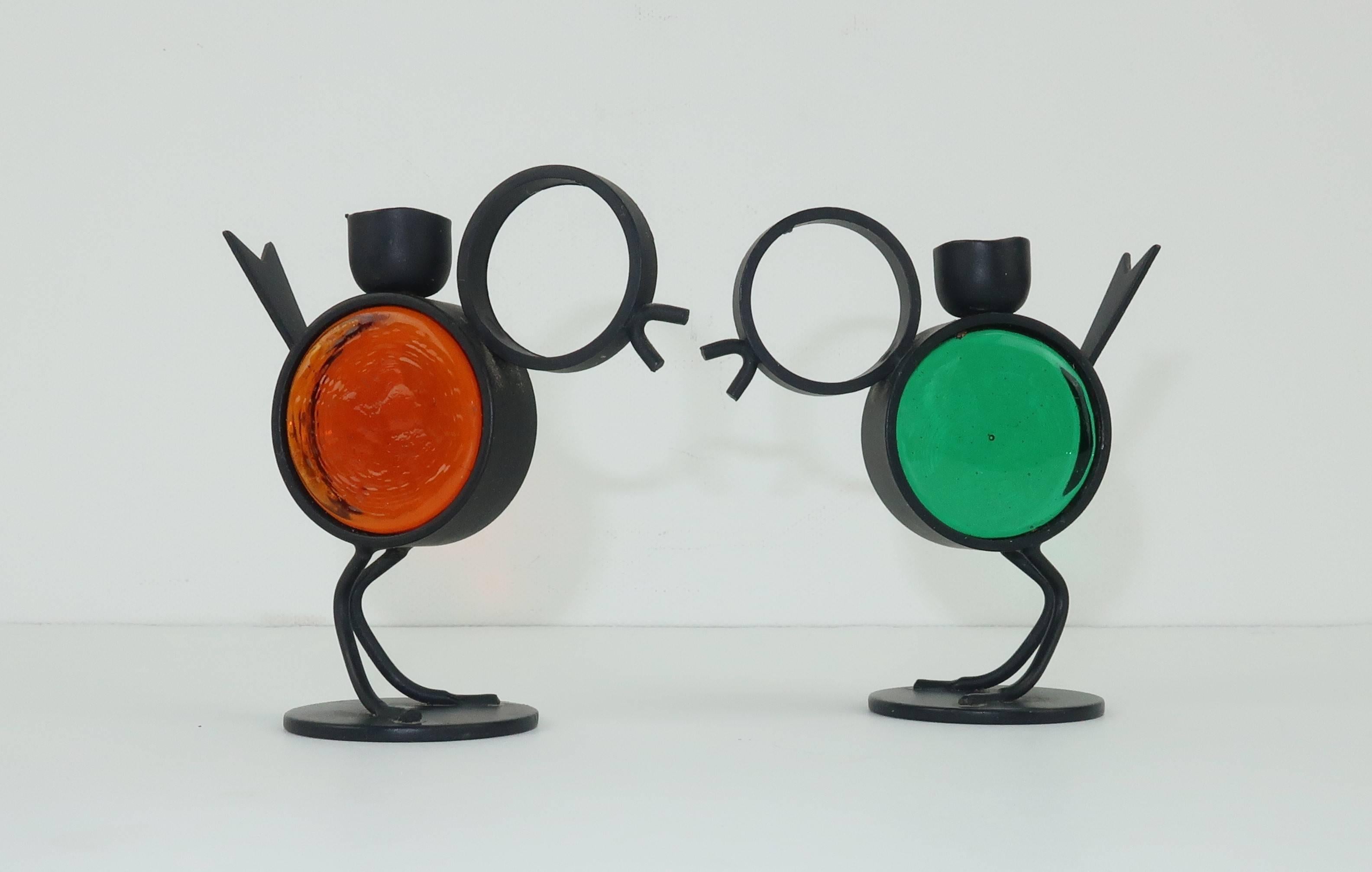 Sweet tweets!  These C.1960 diminutive iron and glass candle holders were designed by Gunnar Ander for Ystall Metall, a Swedish firm specializing in metal works.  The clever silhouette is functional and equally adorable as the birds are easily