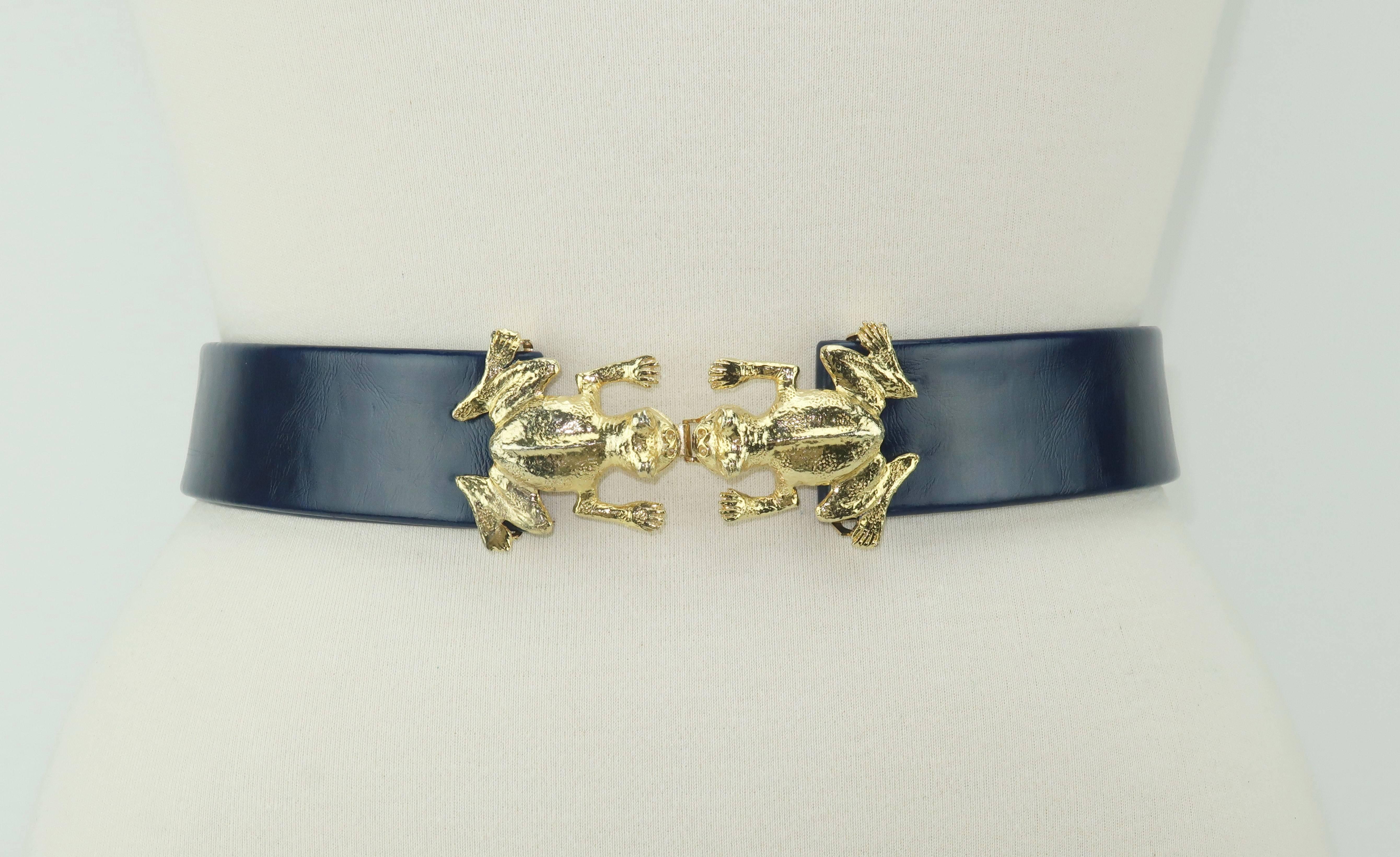 You have found your prince with these adorable kissing gold tone frog buckles designed to mix and match with various color strips allowing for versatility and functionality.  A glossy navy blue faux leather 1.38