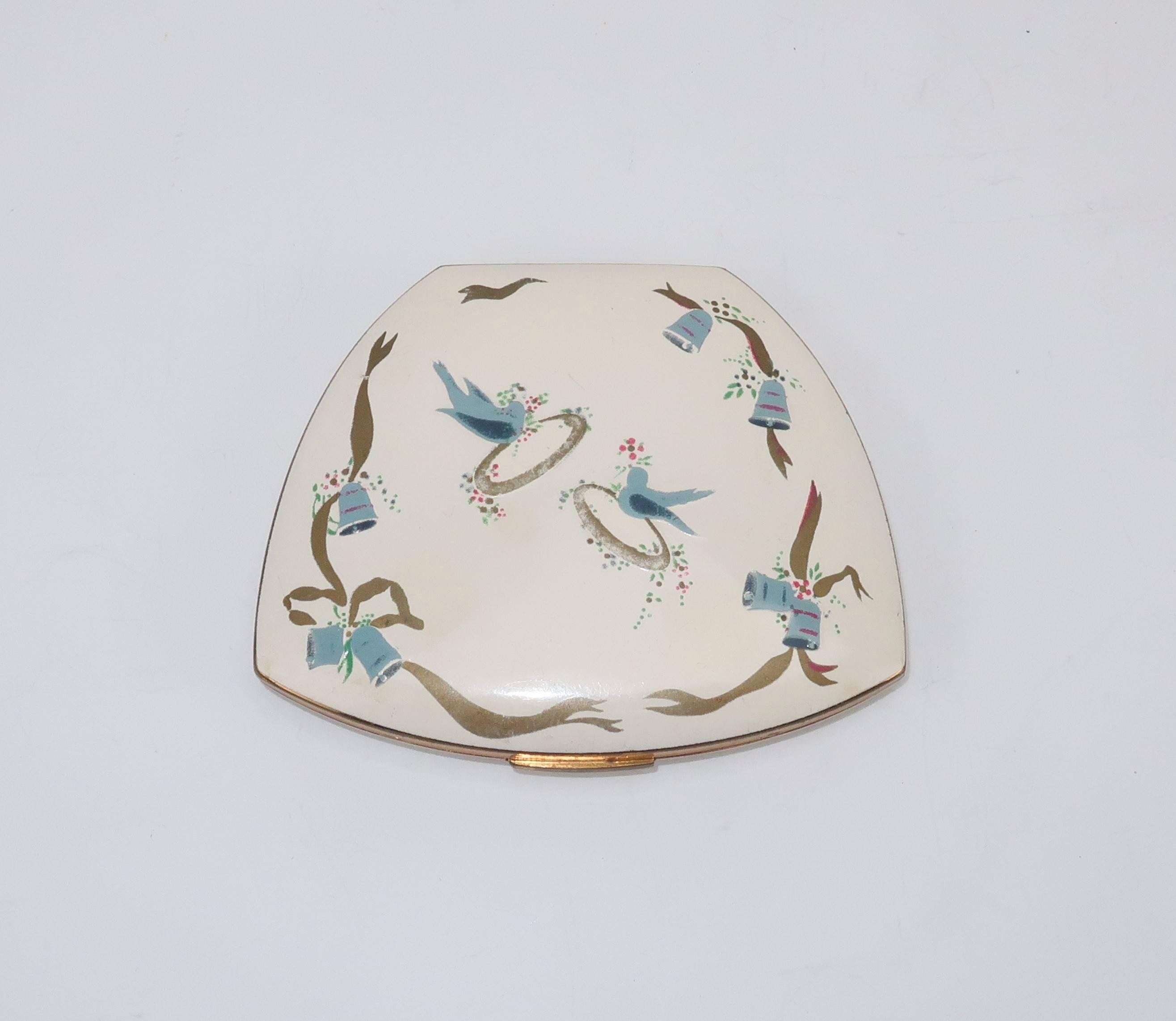 ‘Something old, something new, something borrowed and something blue’ ... add ‘something charming’ and all your bases will be covered with this 1940’s Elgin American mirrored powder compact.  The clam shell shaped gold tone case is whimsically