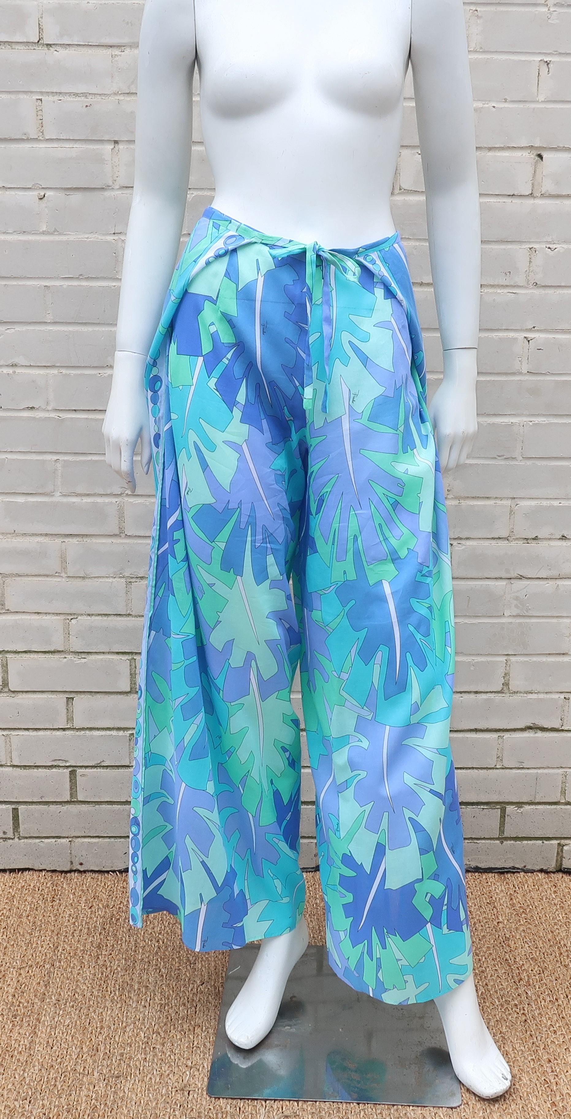 Pucci does beachwear with lightweight cotton wrap pants.  These super comfortable pants are designed to tie front and back  for easy wear with bathing suit attire.  The psychedelic print is a classic Pucci combination of periwinkle blue, aqua, green