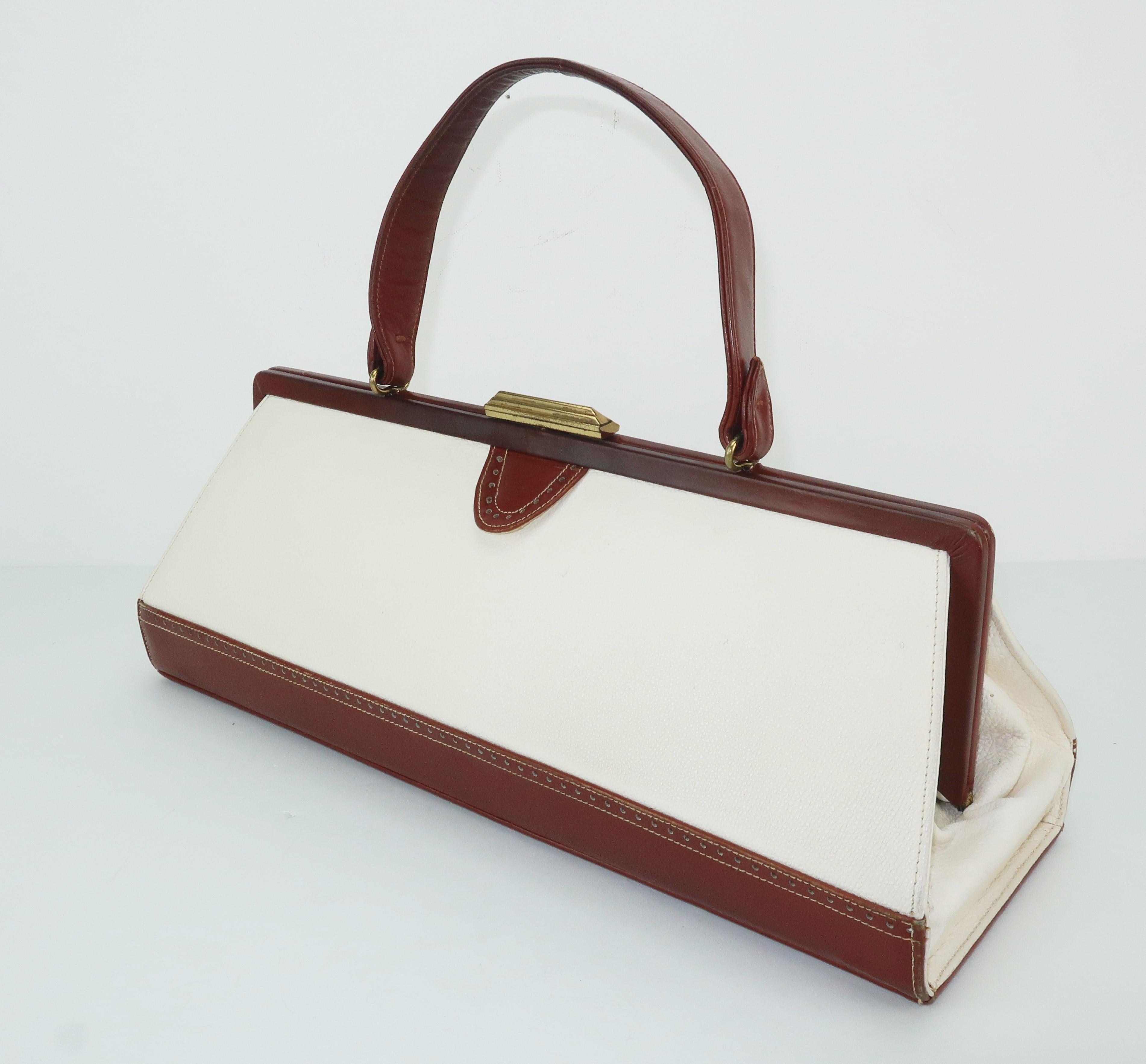 white and brown handbag