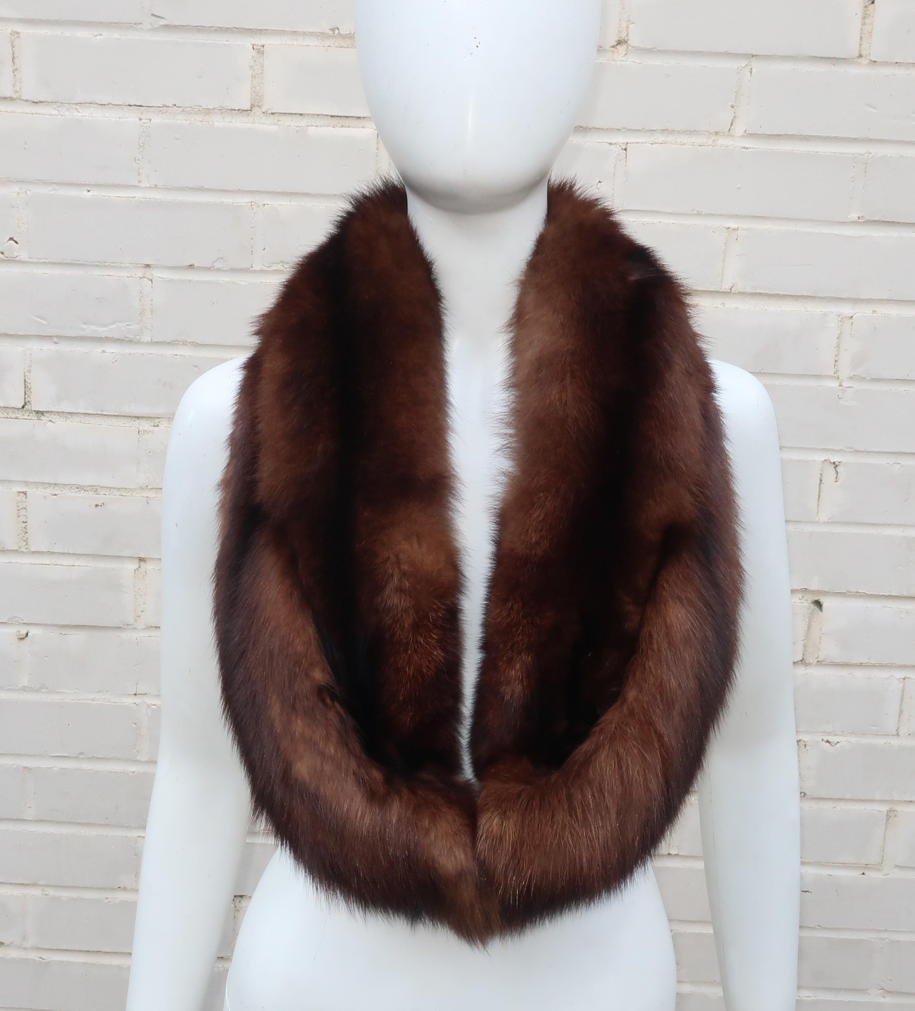 The possibilities are endless with this vintage brown fox fur accessory.  It can be worn as a lush collar for coats, tweed jackets or sweaters and do double duty as an elegant 'shoulder warmer' stole for evening attire.  A different look can even be