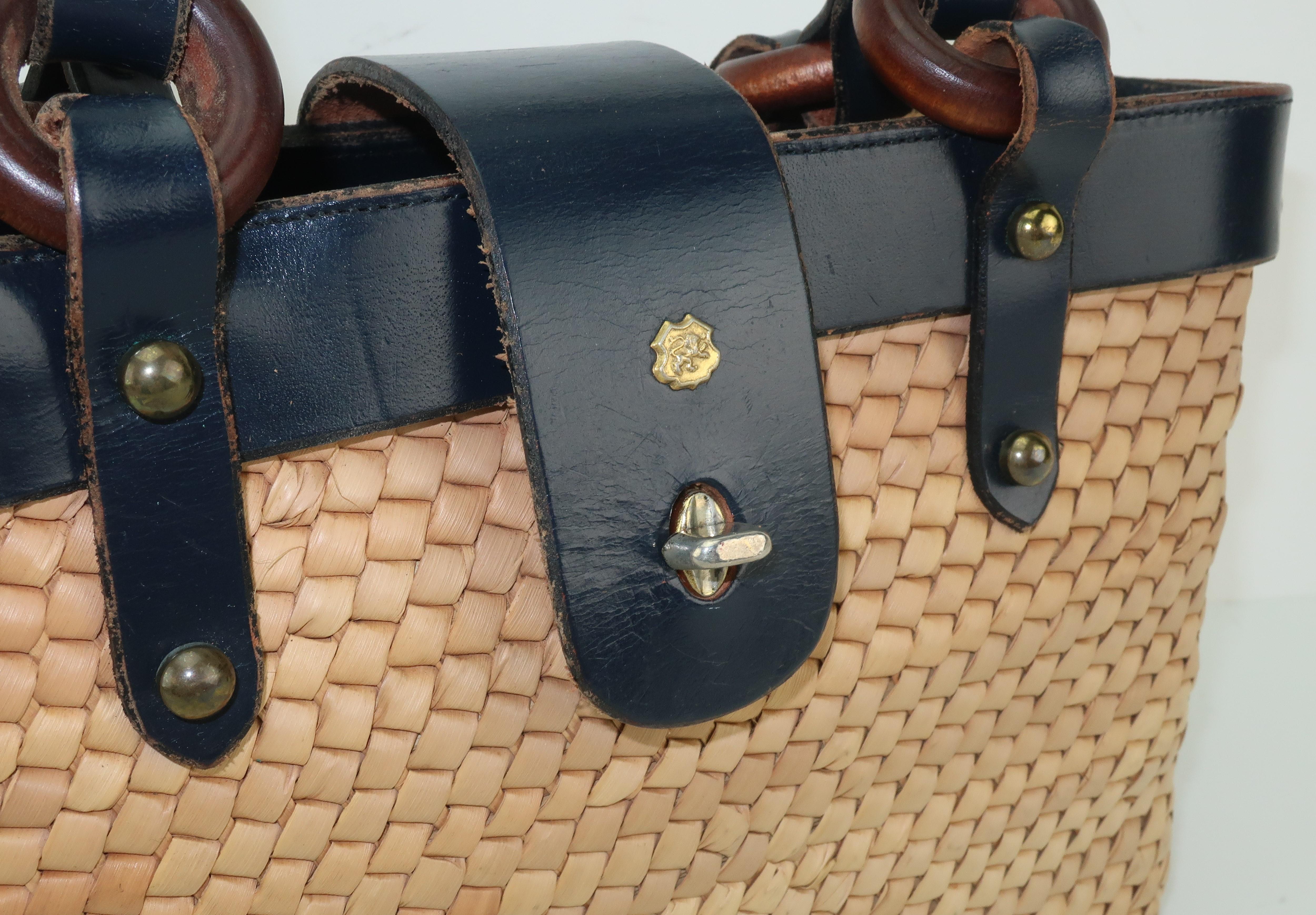 john romain handbag history