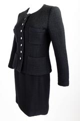 1990s CHANEL Classic Black Bouclé Skirt Suit with Mirrored Logo Buttons