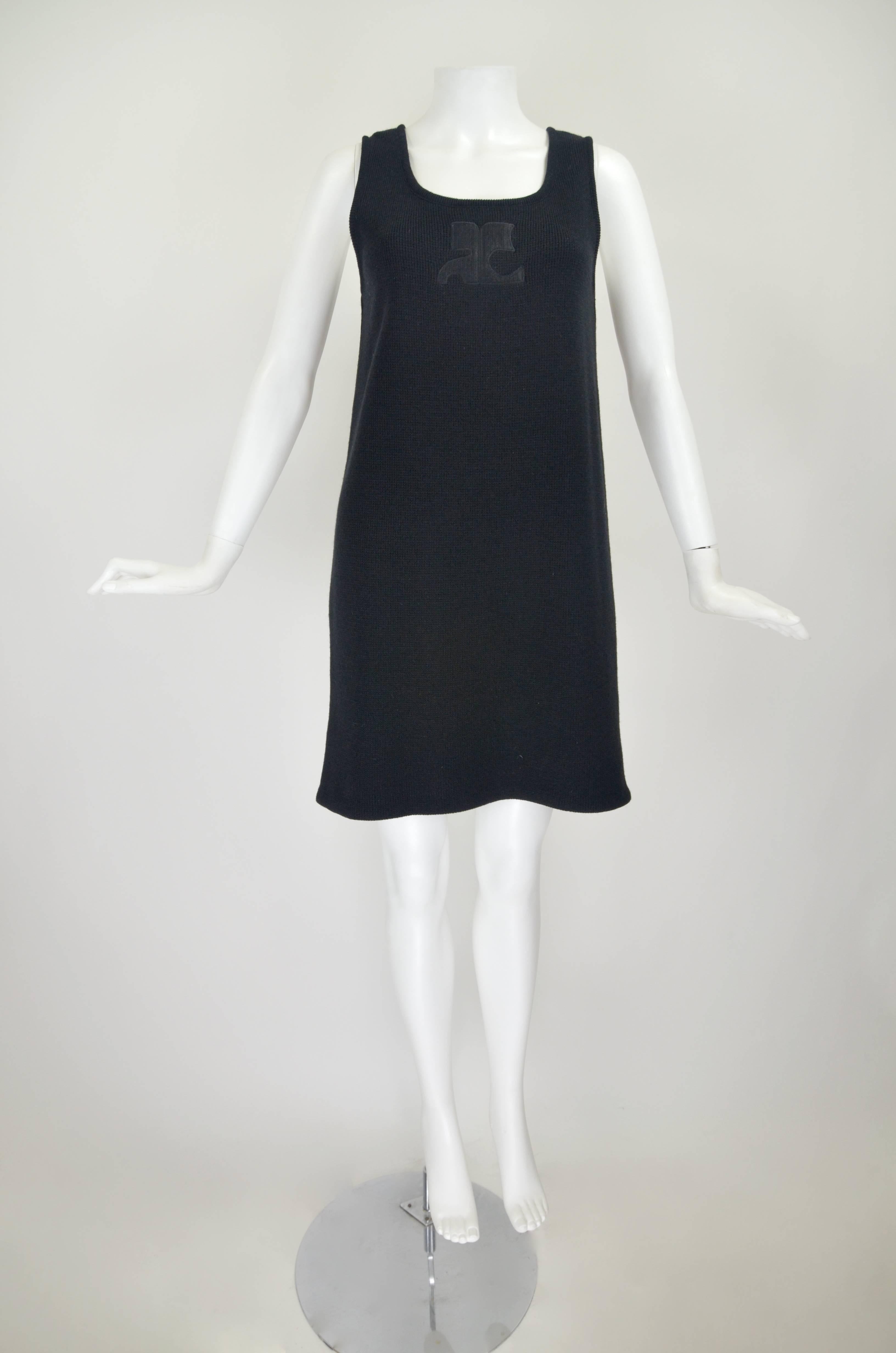 1990s Courreges Black Knit Wool Dress with Iconic Logo

Measurements--
Bust: 34 inches
Waist: up to 35 inches
Hip: up to 37 inches
Length, Shoulder to Hem: 34 inches