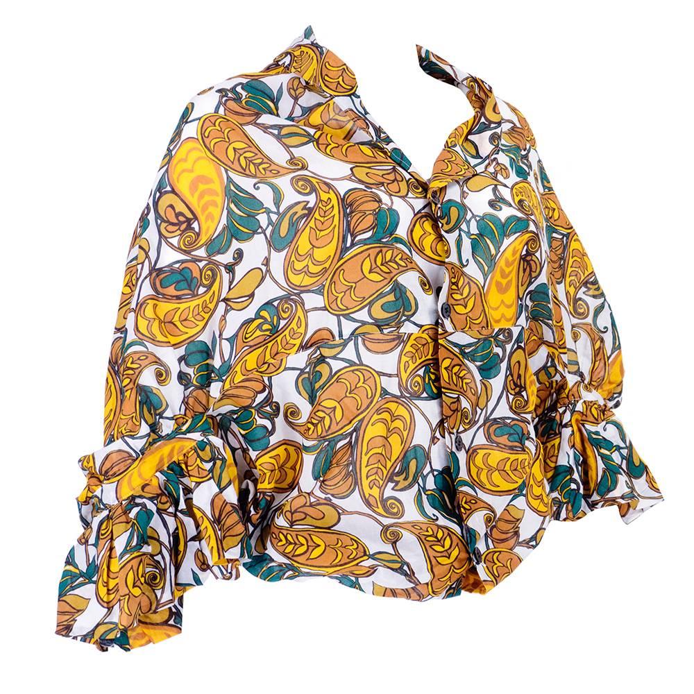 Incredible Junya Watanabe creation - blouse that can be worn two ways- topsy turvy style. Wonderful whimsical print on cotton. Sizing flexible - one size will fit small to medium. Excellent condition - New with tags.