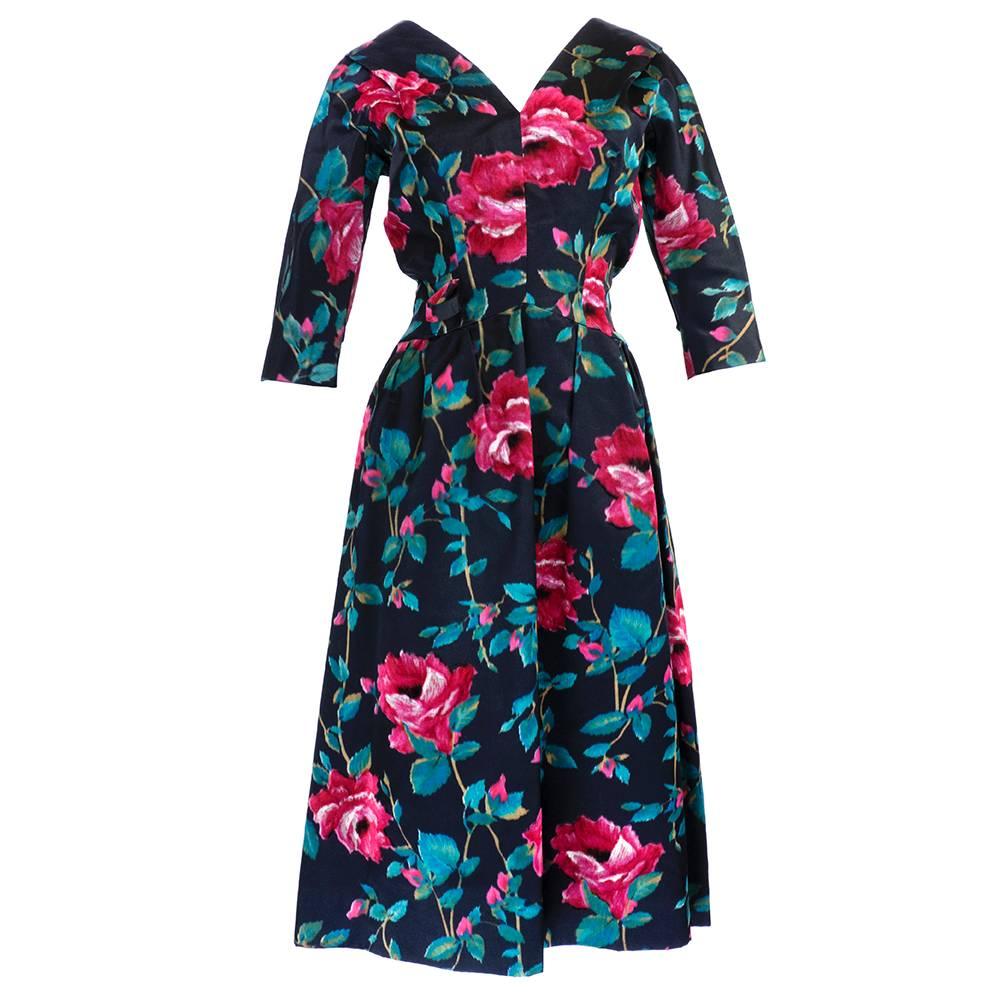 Gorgeous coup de velour dress in a painterly floral. Come with matching semi attached stole. Period proper bracelet length sleeves and full, gathered skirt. High drama!