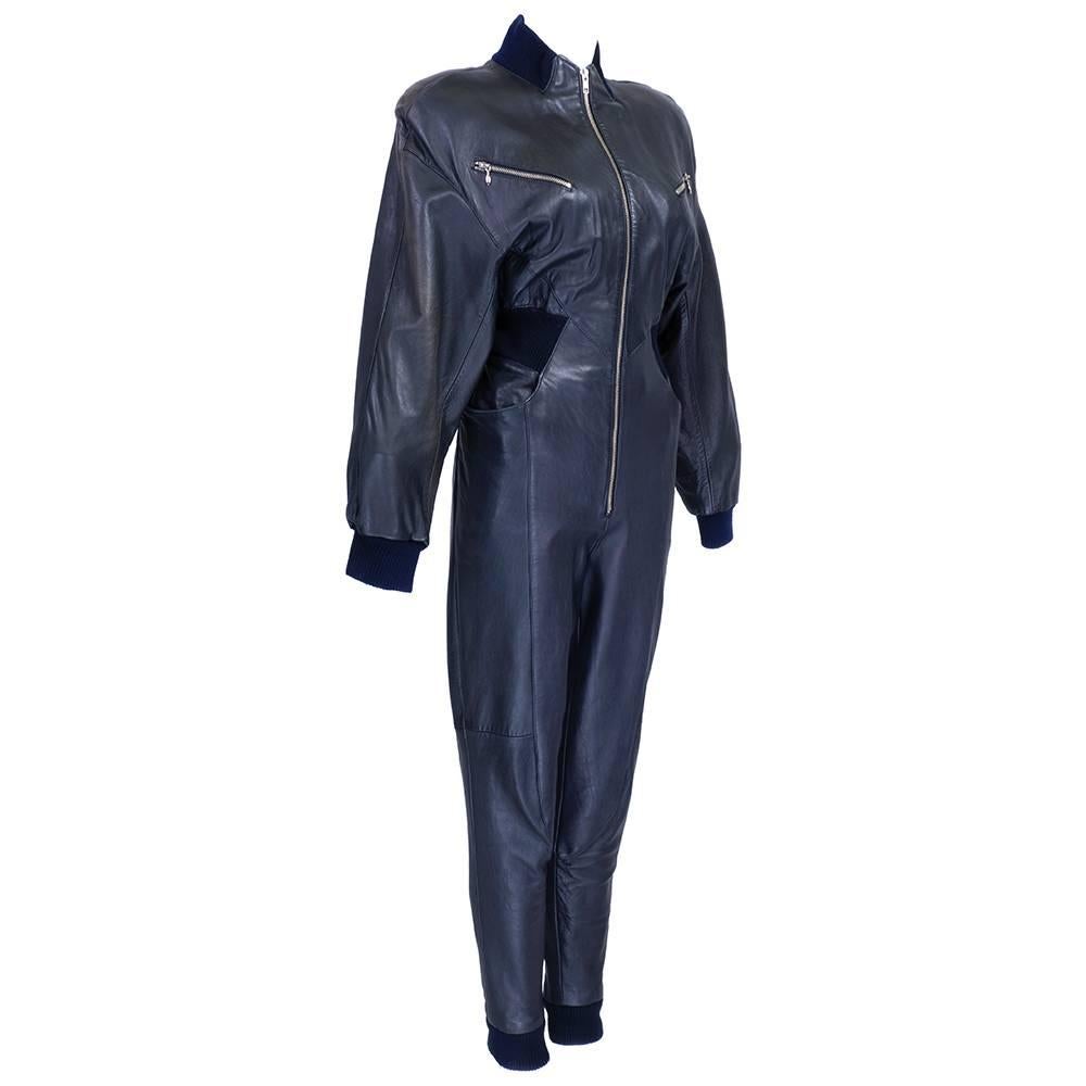 Super sexy full length leather jumpsuit by Michael Hoban for North Beach Leather.  Butter soft leather, fully lined with chromed zip accents. Great, ribbed collar, cuffs and waist detail. Dramatic dropped, dolman sleeves.