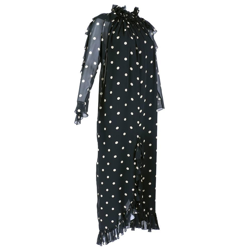 Wonderful, whimsical design by Bill Blass. Black and white polka chiffon gown beautifully draped with great ruffled collar. Fully lined.