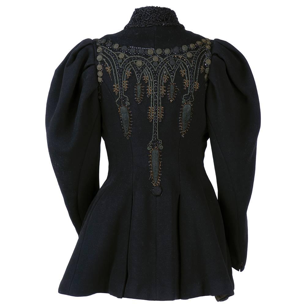 Gorgeous Victorian jacket with large leg of mutton sleeves from approximately the late 1890s. Heavyweight black wool trimmed in mouton fur and embellished with embroidery, beadwork and cord work. Wear commensurate with age makes for a Romantic look,