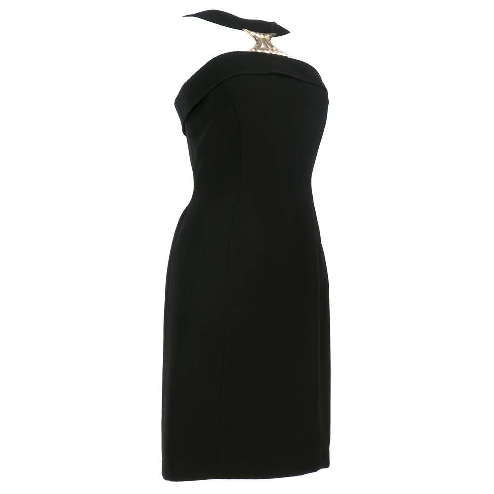 Thierry Mugler Little Black Dress with Hardware from the 1990s. Body con silhouette with hammered, gold tone medallion at neckline. Blended crepe, fully lined.