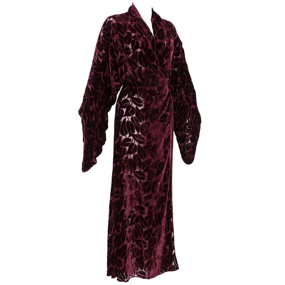 Dramatic, film worthy lingerie item. Deep, lush burgundy cut velvet wrapper with pleated , draped sleeves. Inside tie and hook and eye closure - kimono style.