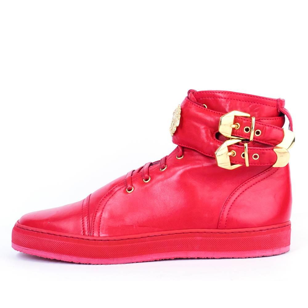 Vintage lifetime  Gianni Versace red leather sneakers from the 90s. Made in Italy - with wraparound ankle strap with buckles and classic Medusa head medallion. Leather laces. 

Tagged size 38