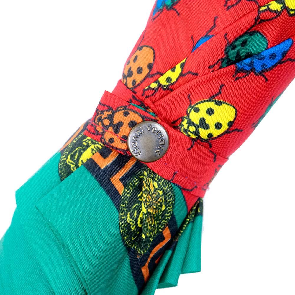 Lifetime Versace umbrella in red with ladybug print.