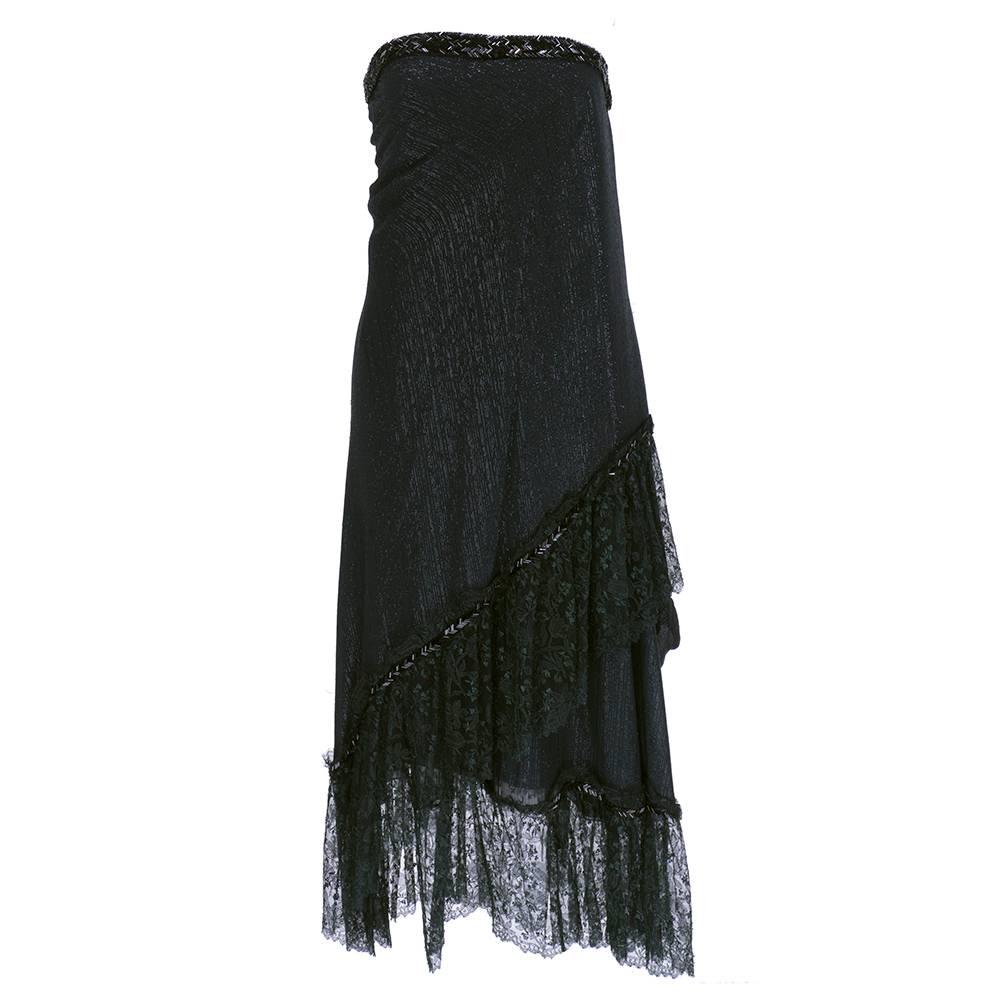 Boho chic by Stavropoulos circa 1970s. Black layered shimmery chiffon with asymmetrical hem trimmed in chantilly lace and bugle beads. Super sexy. Comes with matching shawl.

Shawl measures: 46"x46"
