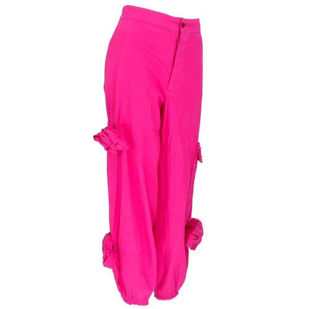 Unlabelled but attributed to Comme des Garcons hot pink cotton cropped cargo pants. Button fly with interesting knotting detail and raw edged seams.