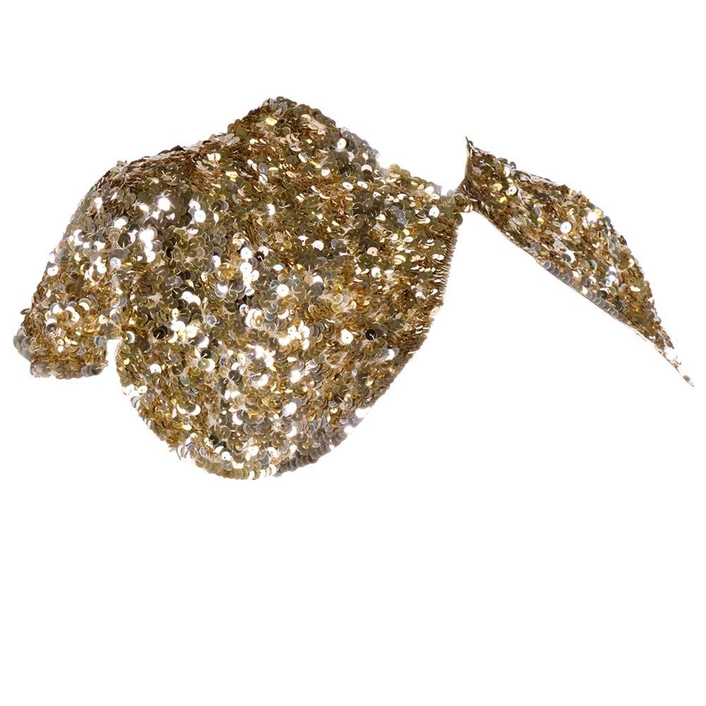 Great accessory piece from 1930s. Delicate net with scalloped edges festooned with golden sequins.  Perfect summer time cover up.