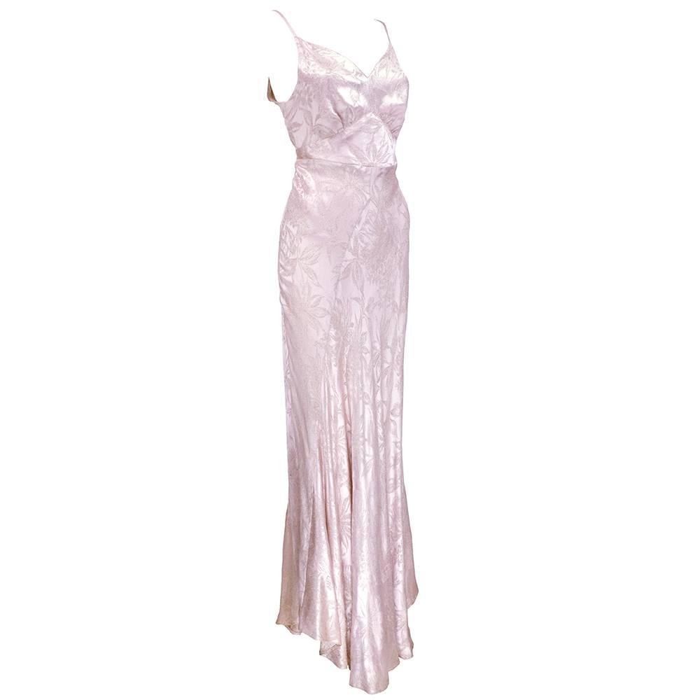 Beautifully constructed 1930s style bias cut gown made recently by master seamstress . Silver lame on whisper pink satin. Great alternative to more delicate pieces from the era.  Unlined. Fabric is gorgeous in person!
