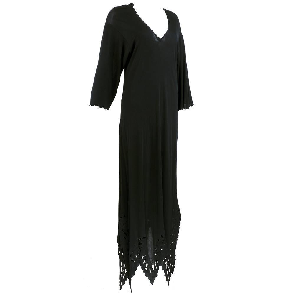Stevie Nicks vibes. Black jersey dress with cut out floral embroidered trim  and scalloped edges by Giorgio Sant Angelo. Maxi style. Lightweight with great drape. 