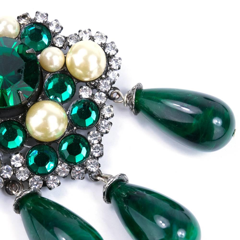 Extra large glamazon style by master jewelry designer Larry Vrba. Faux Emeralds, pearls and rhinestones make up this giant drop earring. With glass  tear drop dangles. For serious divas only.