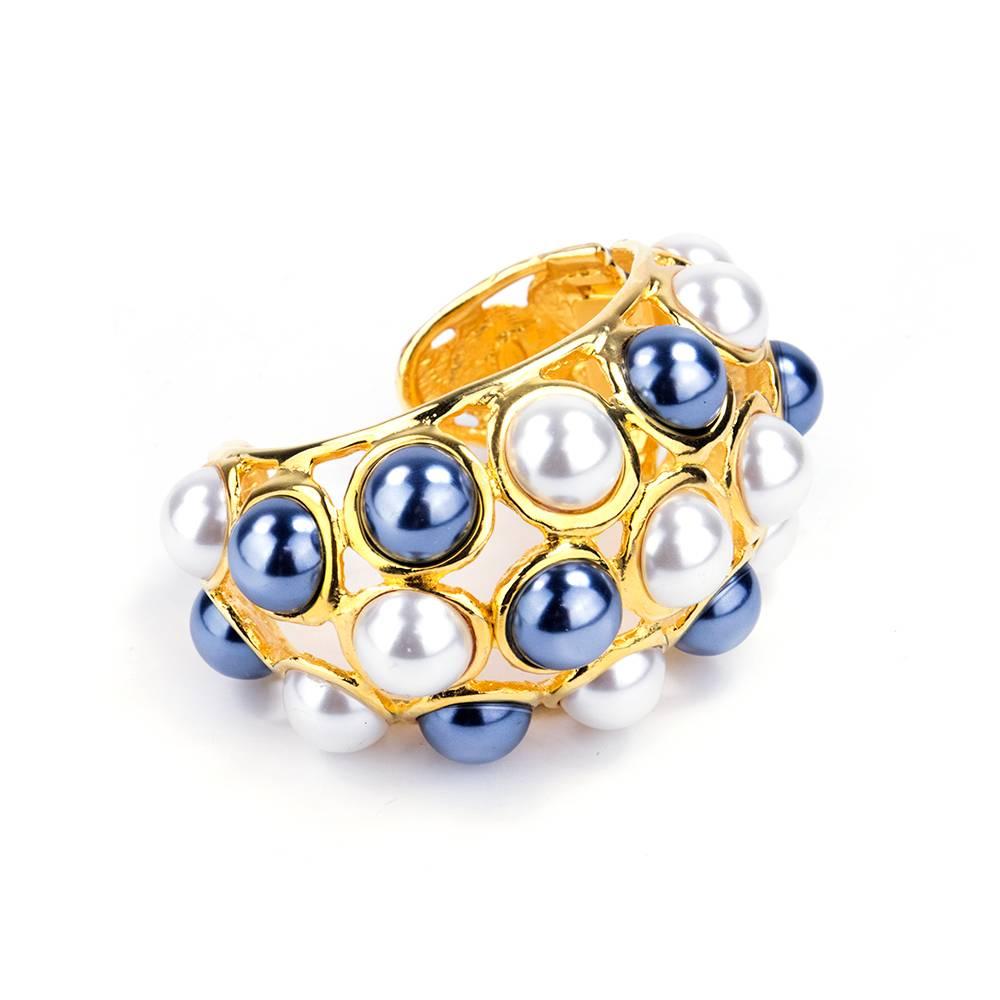 Kenneth Jay Lane Wide Faux Pearl Encrusted Cuff. Hinge opening. Bright gold tone with with natural  and black faux pearls.  Signed KENNETH LANE.