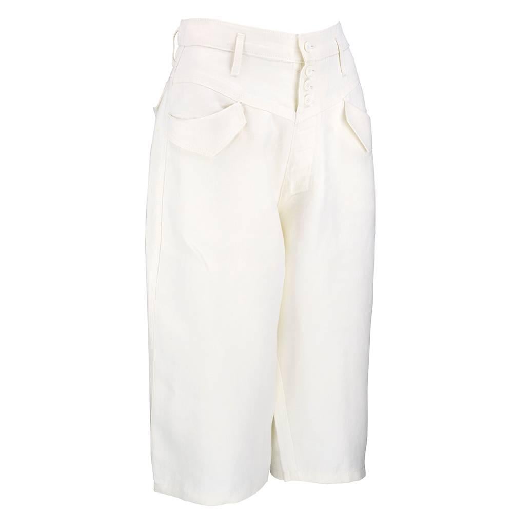 Heavyweight linen cropped pant by house of Balenciaga. Slightly low slung waist with slash pockets and button fly. Unlined with wide legs.