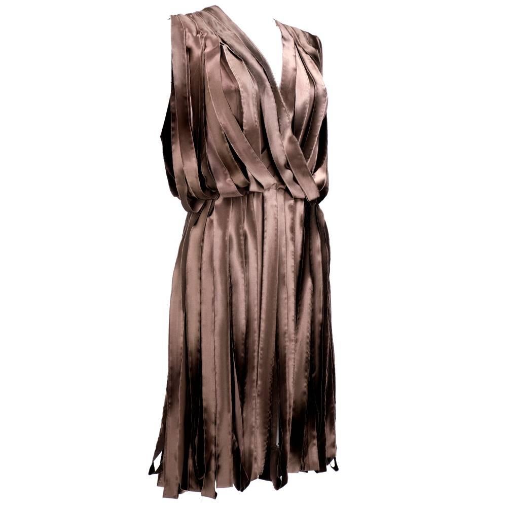 2004 LANVIN Satin ribbon strips free floating to create a 'car wash' effect.  Strips have raw edges and are sewn at the shoulders and on the waist.  Dress has built in same fabric slip.  This dress undulates and is fabulous on!