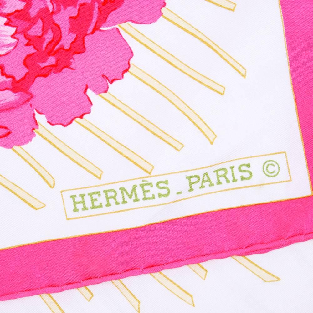 Hermes silk scarf circa 1990s with peonies in woven basket motif. Great large scale in tones of pink and coral with lovely spring greens.  Titled 