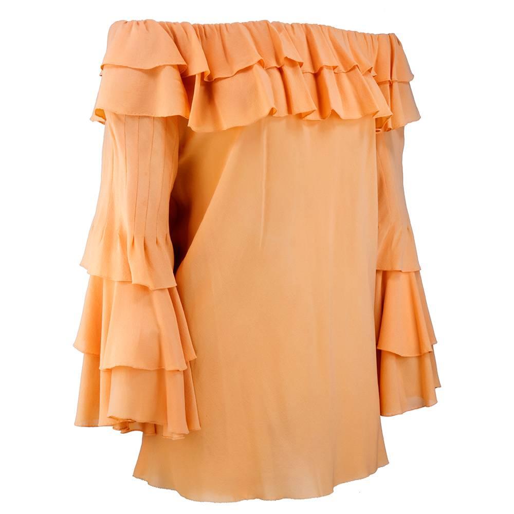 Beautiful blouse with couture finishing. Peach silk chiffon peasant style blouse with elasticized neckline that can be worn on or off the shoulders. Tiered ruffled 3/4 sleeves. Unfinished hem. Unlined and lightweight - perfect for summer. By lesser
