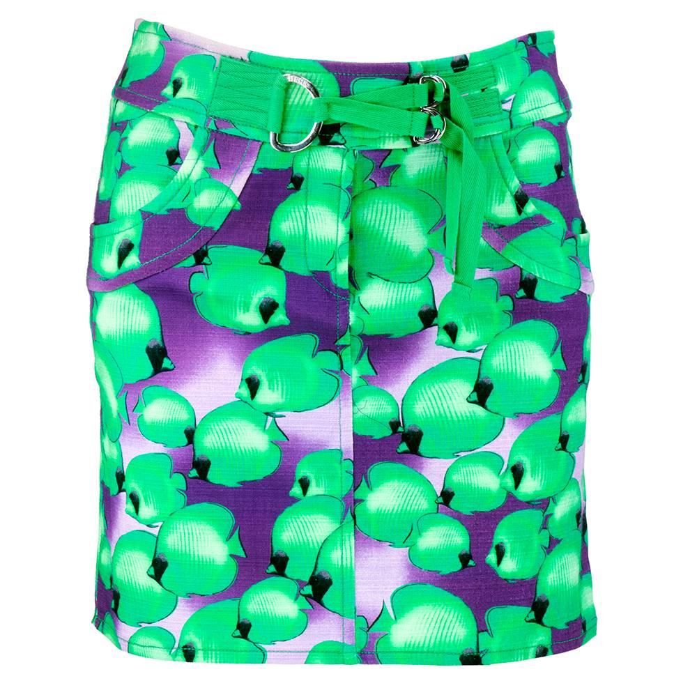 90s era mini skirt by Versus for Versace. Cute fish print in bright green and deep purple. Attached toggle closure at waist with zip fly. Unlined with hip pockets. Great for summer.