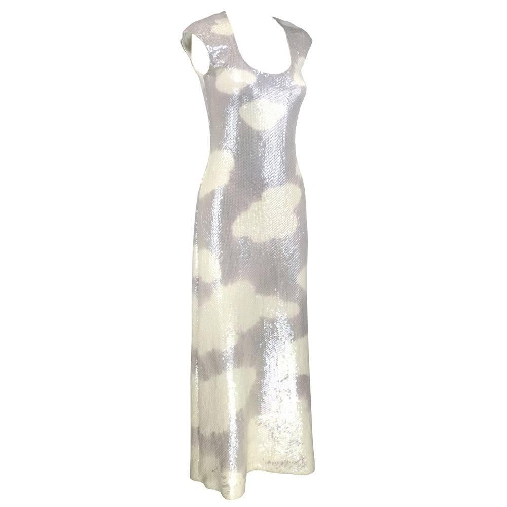 There is nothing better than this! Rare and iconic piece by American legend Halston. In tones of dove grey with white clouds on stretchy mid-weight knit completely overlaid with iridescent sequins in the designers signature flat style. Fully lined