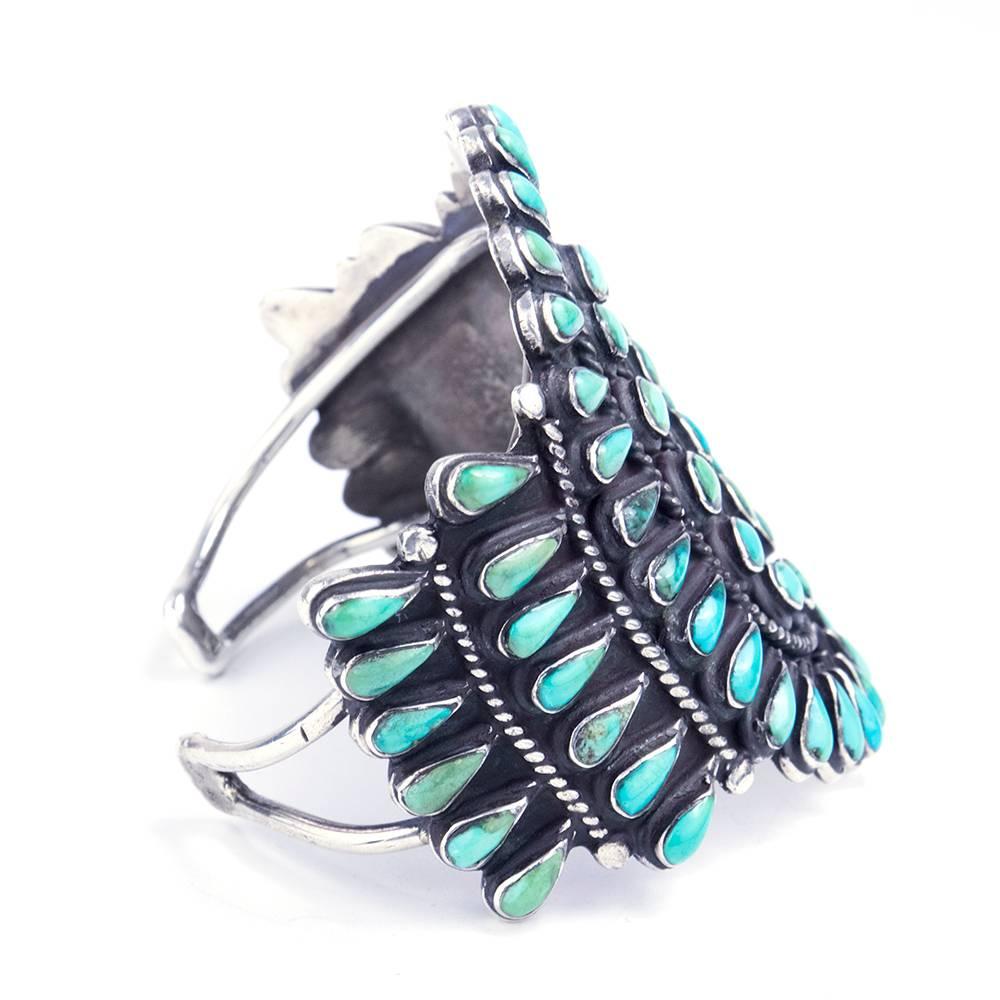 Bigger is absolutely sometimes better! Giant silver cuff encrusted with Fine turquoise. Weighty and solid heirloom piece.