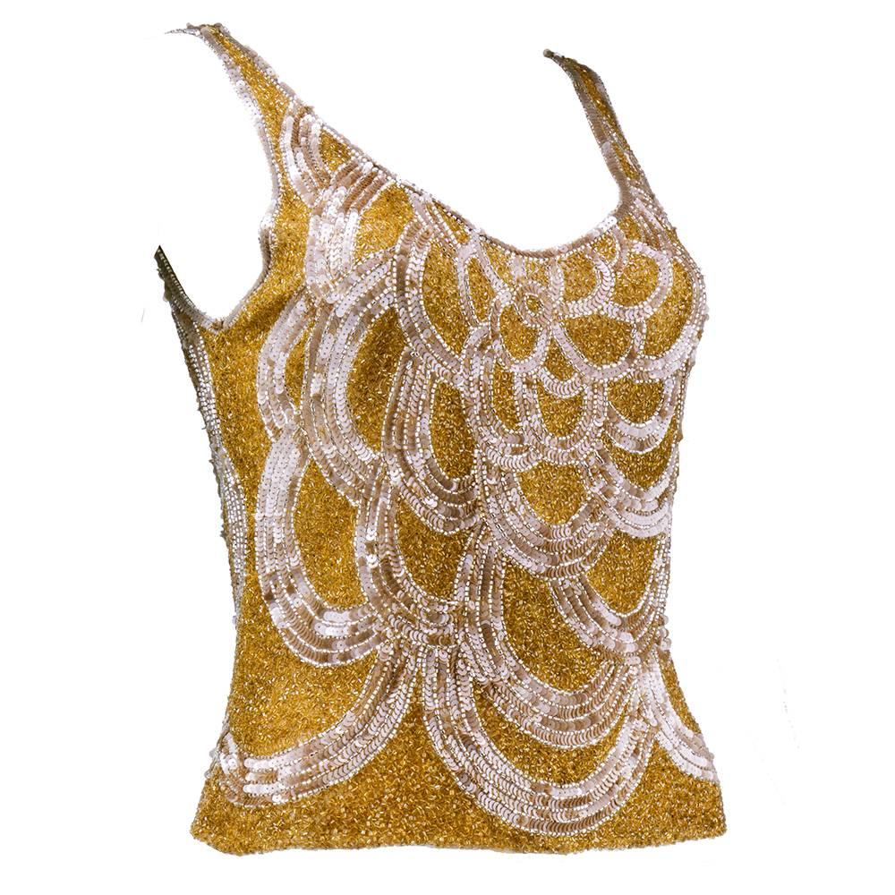 Tank style shell top with gold and silver beads and iridescent sequins in deco motif pattern. Unlined and sheer net base. By iconic designer Vivienne Tam. Light and sexy and ready for summer.