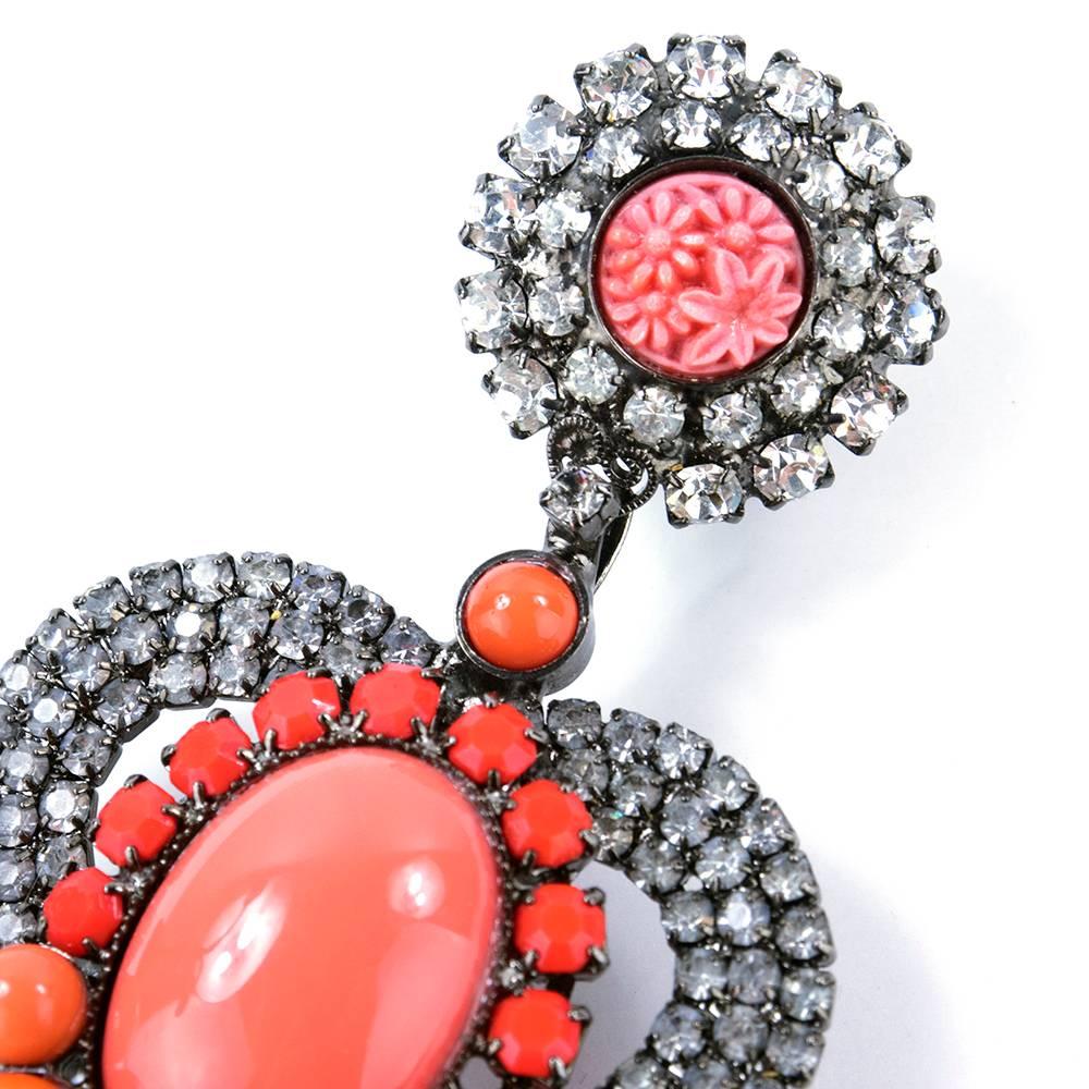 Mondo statement earrings by designer Larry Vrba - known for using vintage findings to create spectacular statement pieces. Huge chandelier style with heart shaped rhinestone center with coral accents and dangles. Extra sturdy clip backs.