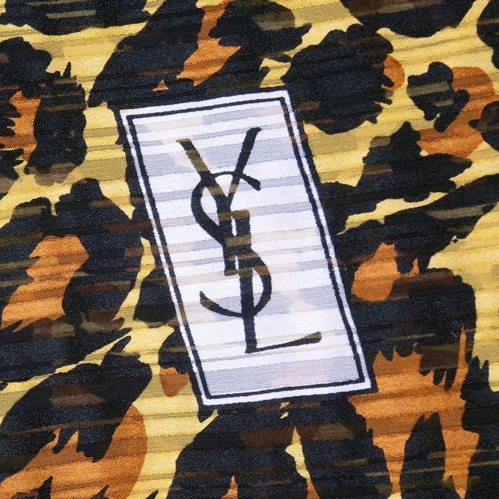 The perfect accessory by YSL. Wear it as a head scarf or wrap. Leopard camo-print silk square with hand rolled edges.  Semi-sheer.