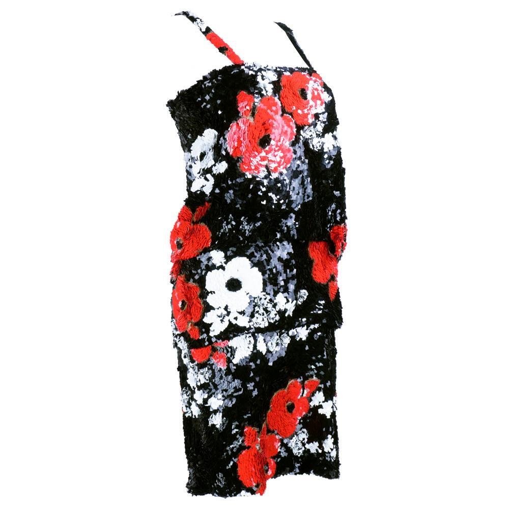  20s flapper style dress by the usually minimalist Jil Sander. Tiered and heavily sequined in abstract floral pattern. Classic yet avant garde. Fully lined.