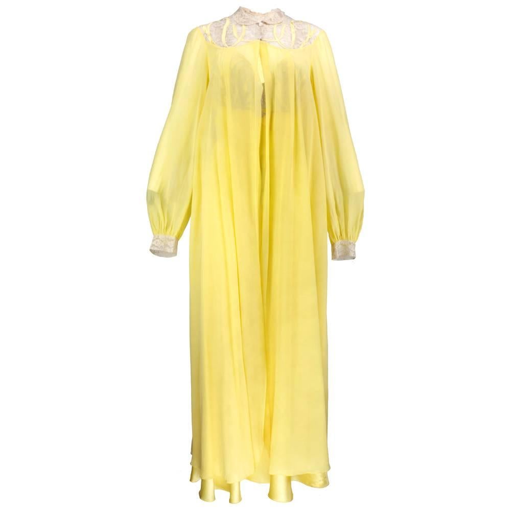 So rare and beautiful. Perfectly lovely peignoir consisting of lemon yellow silk satin nightgown inset with nude lace at bodice. Fagotted seams at bust line. With matching sheer chiffon robe that buttons at neck and remains open until hem. Flowy and