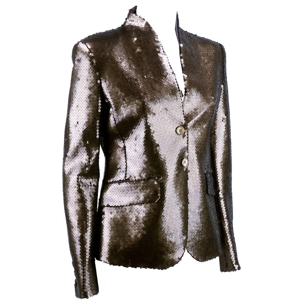 Ultra modern and chic. Iridescent brown sequins adorn this collarless, tight fitting blazer by the master Alexander McQueen. Perfect evening topper.  Faux button snap closure, fully lined with faux pockets.